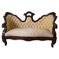 Two-seater Louis Philippe sofa in walnut and fabric, 19th century era