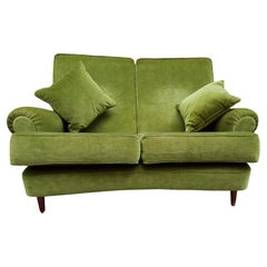 Italy 1960s two-seat upholstered sofa in green velvet