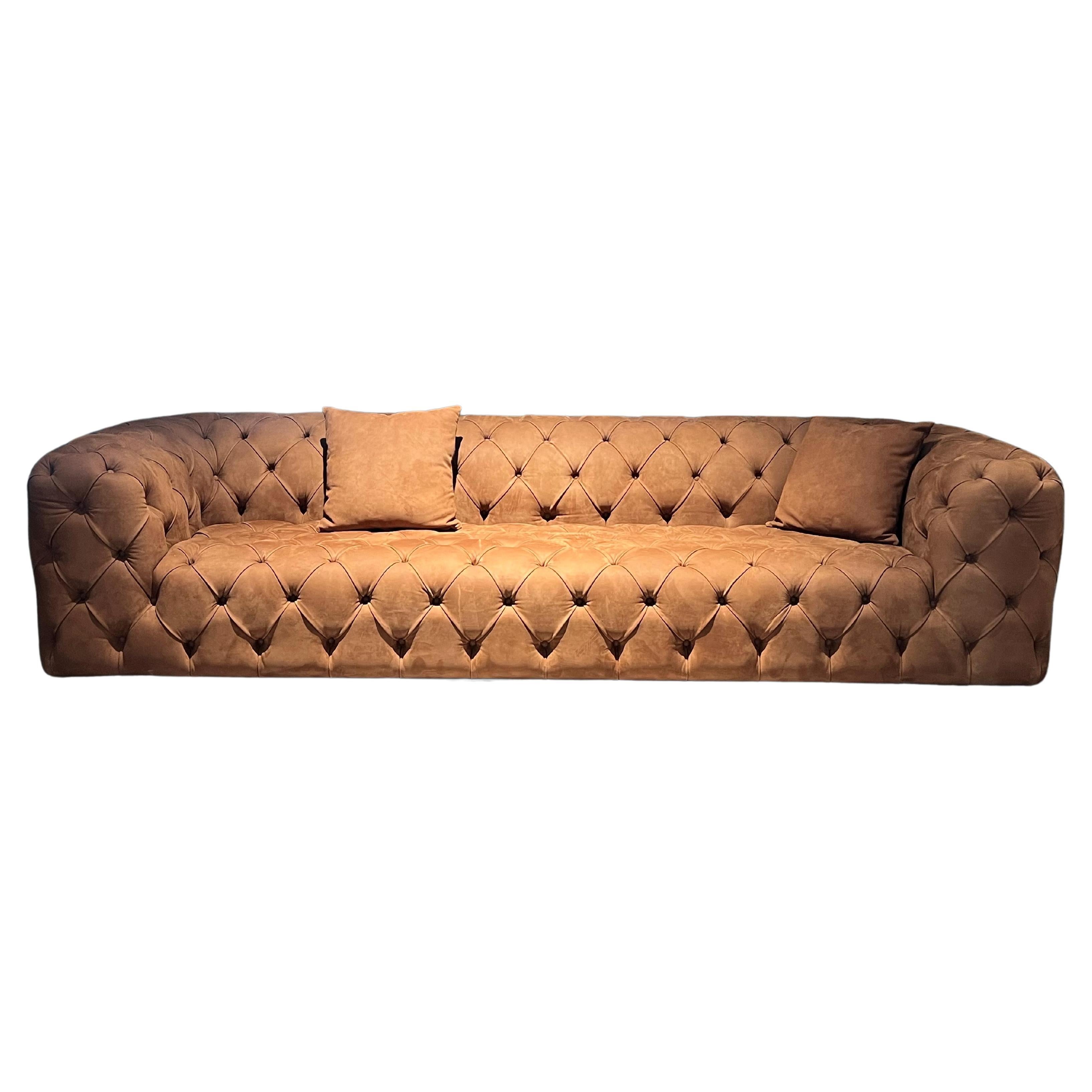 Oxford three-seater capitonné sofa in brick-colored nubuck leather