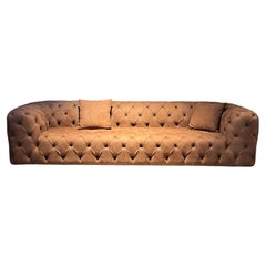 Oxford three-seater capitonné sofa in brick-colored nubuck leather