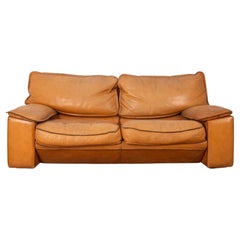 Vintage 70s beige leather sofa designed by Ferruccio Brunati