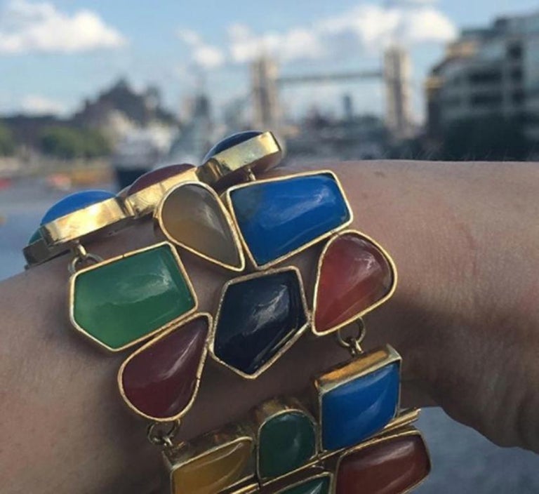 This multicolored statement bracelet is absolutely fabulous, both aesthetically and in its story. It is a piece certain to catch attention with multiple senses, and most importantly it will touch the heart. This collection is the handwork of