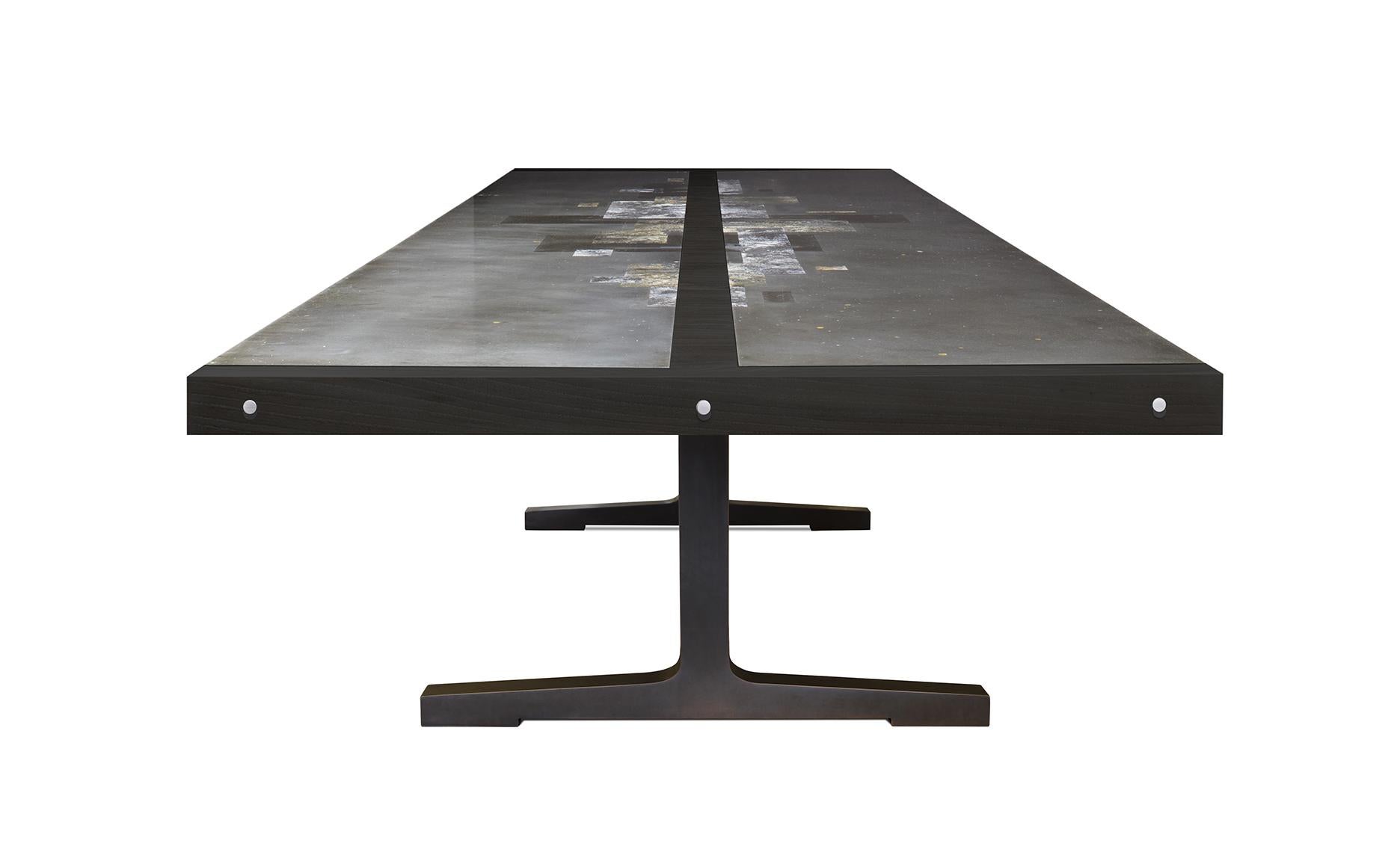 A work of art for your dining room! This Studio Roeper original features an acid-etched zinc top in our signature patina style. The Industrial character of the metal is complemented by the neutral black palette of the ebonized walnut wood finish.