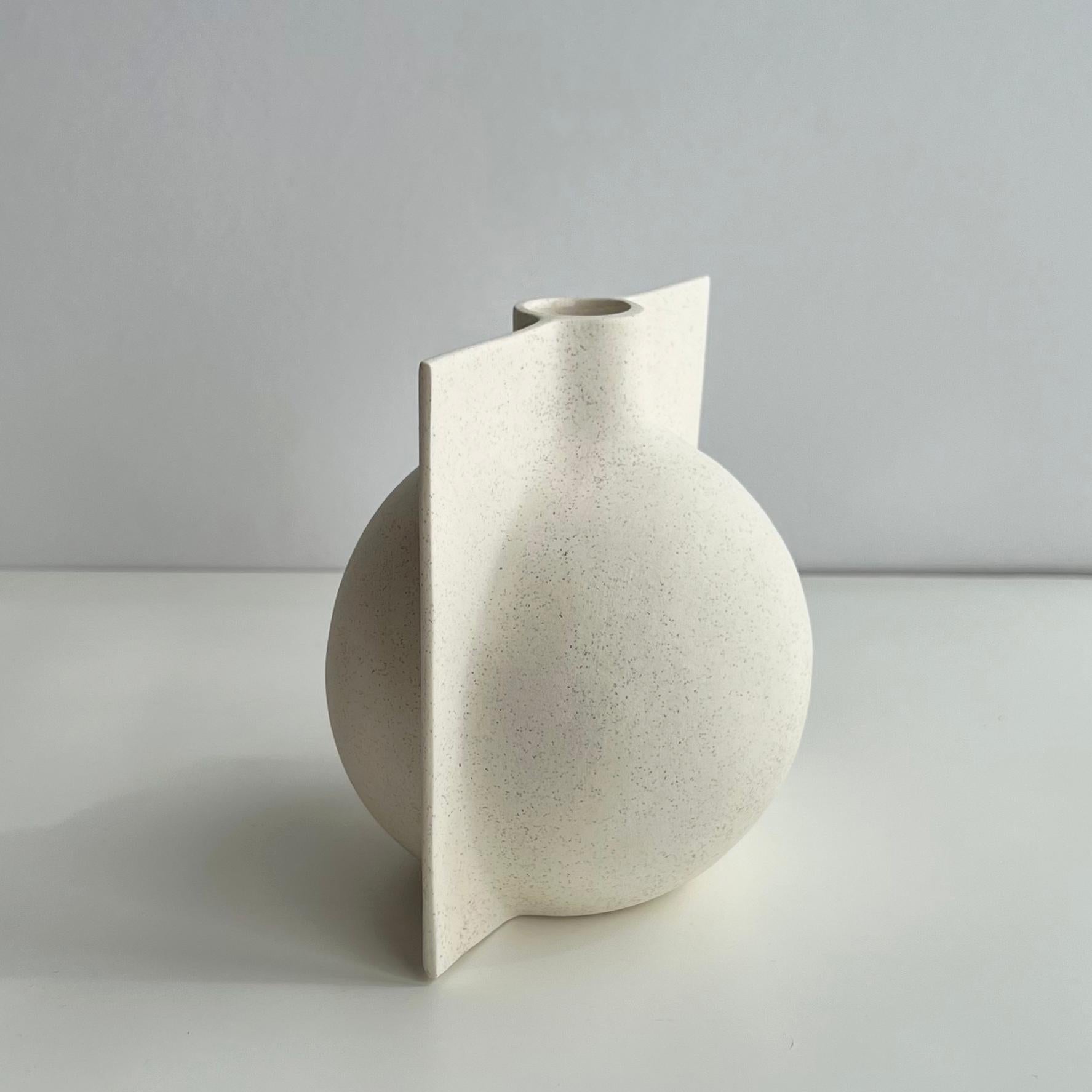 Divided Sculptural Vessel by Karin Amdal
One Of A Kind.
Dimensions: D 14 x W 12.5 x H 14 cm.
Materials: Ceramic/stoneware clay.

Pieces are hand-made, one of a kind, and sizes may vary slightly. Can be made to order in grey/brown/black/white