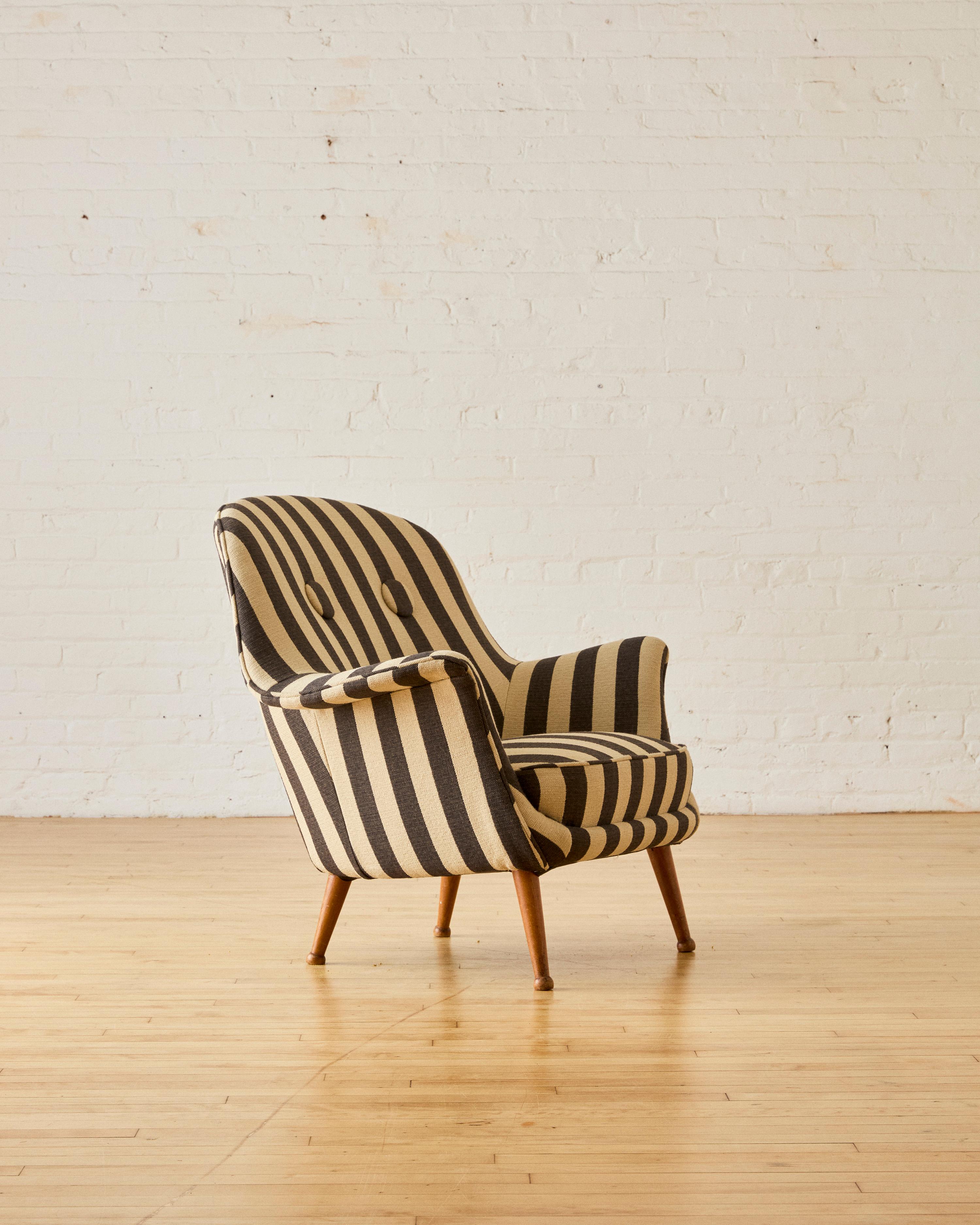 Divina Lounge Chair by Arne Norell for Westbergs Möbler, re-upholstered in striped Kravet performance fabric, (recently discontinued) supported by Beech wood legs. Arne Norell (1917–2001) was a renowned Swedish furniture designer and architect

