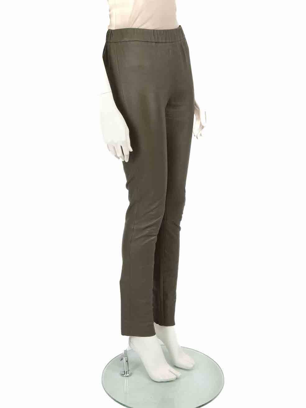 CONDITION is Very good. Hardly any visible wear to trousers is evident on this used Divine Cashmere designer resale item.
 
 
 
 Details
 
 
 Green
 
 Leather
 
 Skinny trousers
 
 Mid rise
 
 Stretchy
 
 Elasticated waistband
 
 
 
 
 
 Made in