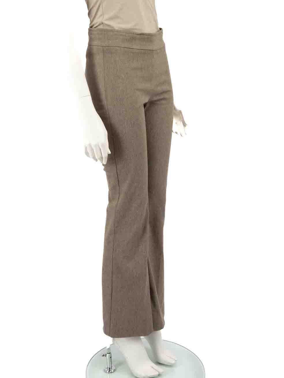 CONDITION is Very good. Hardly any visible wear to trousers is evident on this used Divine Cashmere designer resale item.
 
 
 
 Details
 
 
 Grey
 
 Viscose
 
 Trousers
 
 Straight leg
 
 Skinny fit
 
 Stretchy waistband
 
 
 
 
 
 Made in USA
 
 
