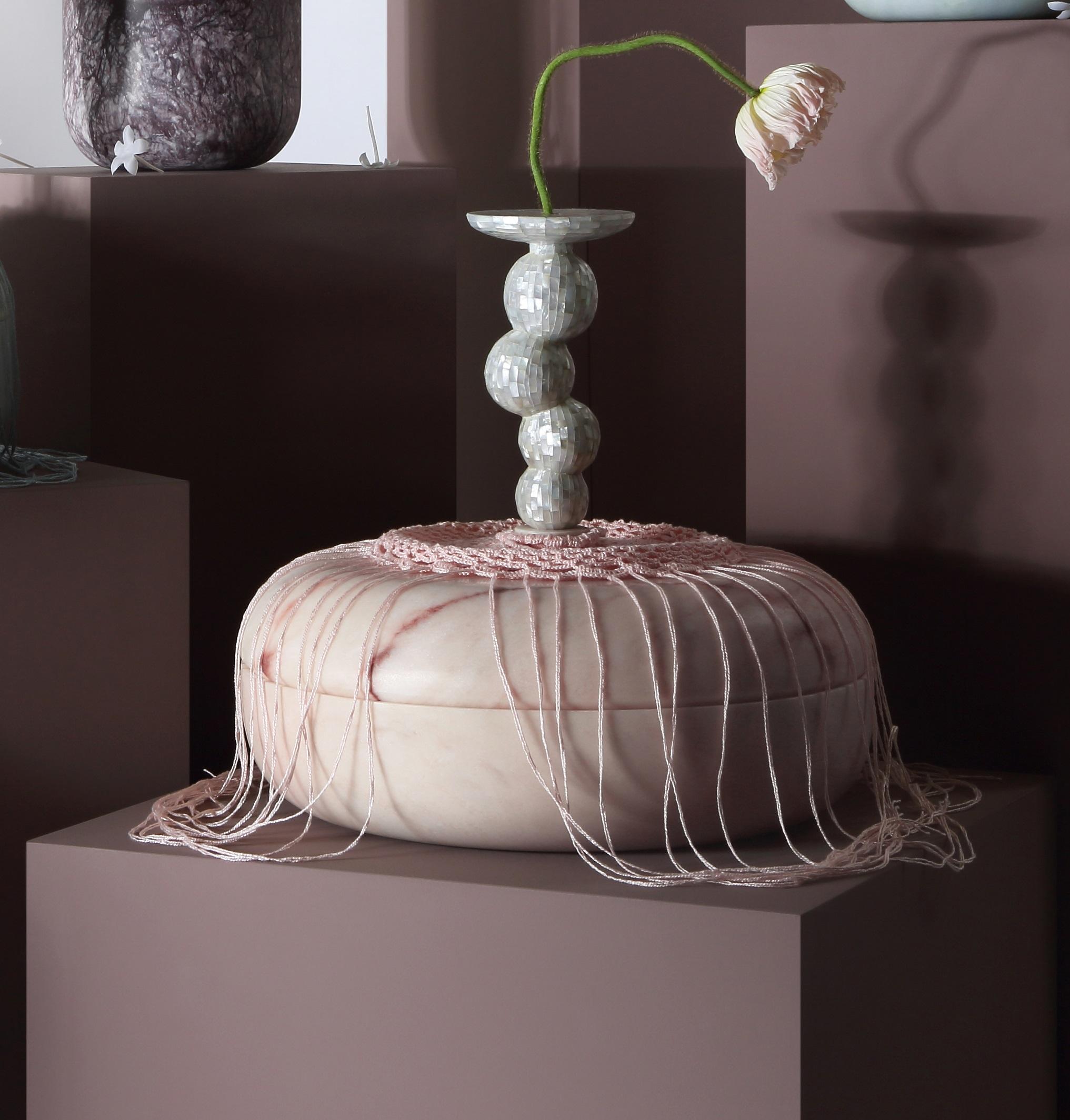 Divine Decadence Multifunctional Object in Rose Aurore Marble by Richard Yasmine
Dimensions: Vase: Ø 40 x H 18 cm.
Base: Ø 18 x H 10,5 cm.
Head: Ø 10,5 x H 25 cm.
Candleholder: Ø 5 x H 6 cm.
Materials: Rose Aurore marble, thread, wood, and mother of