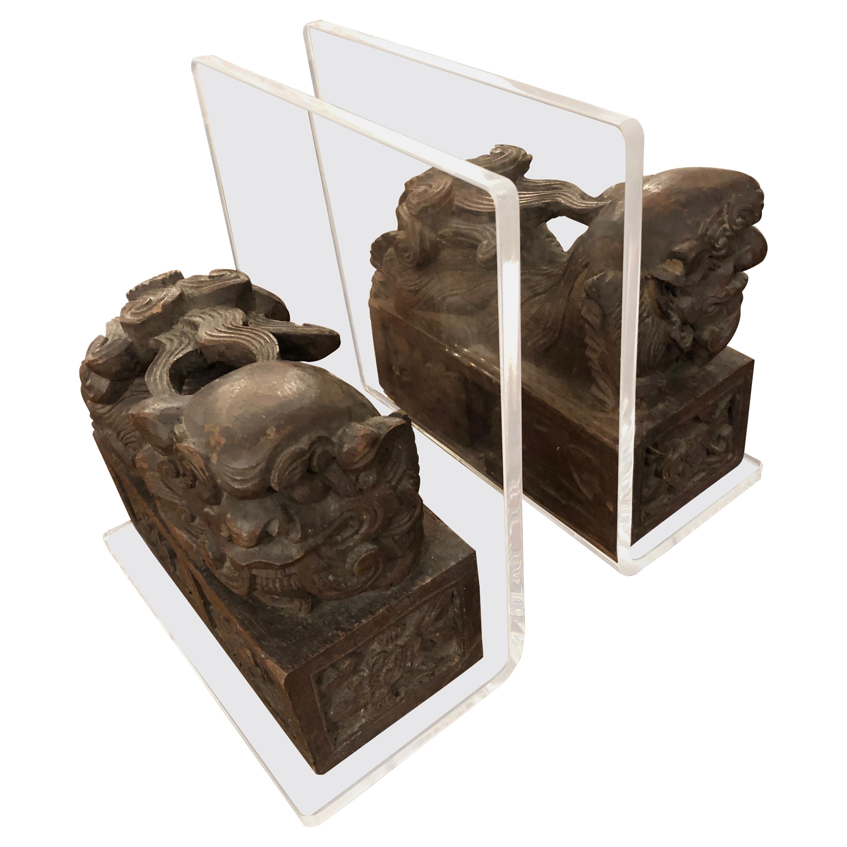 Divine Pair of Carved Wood Foo Dogs and Lucite Bookends For Sale
