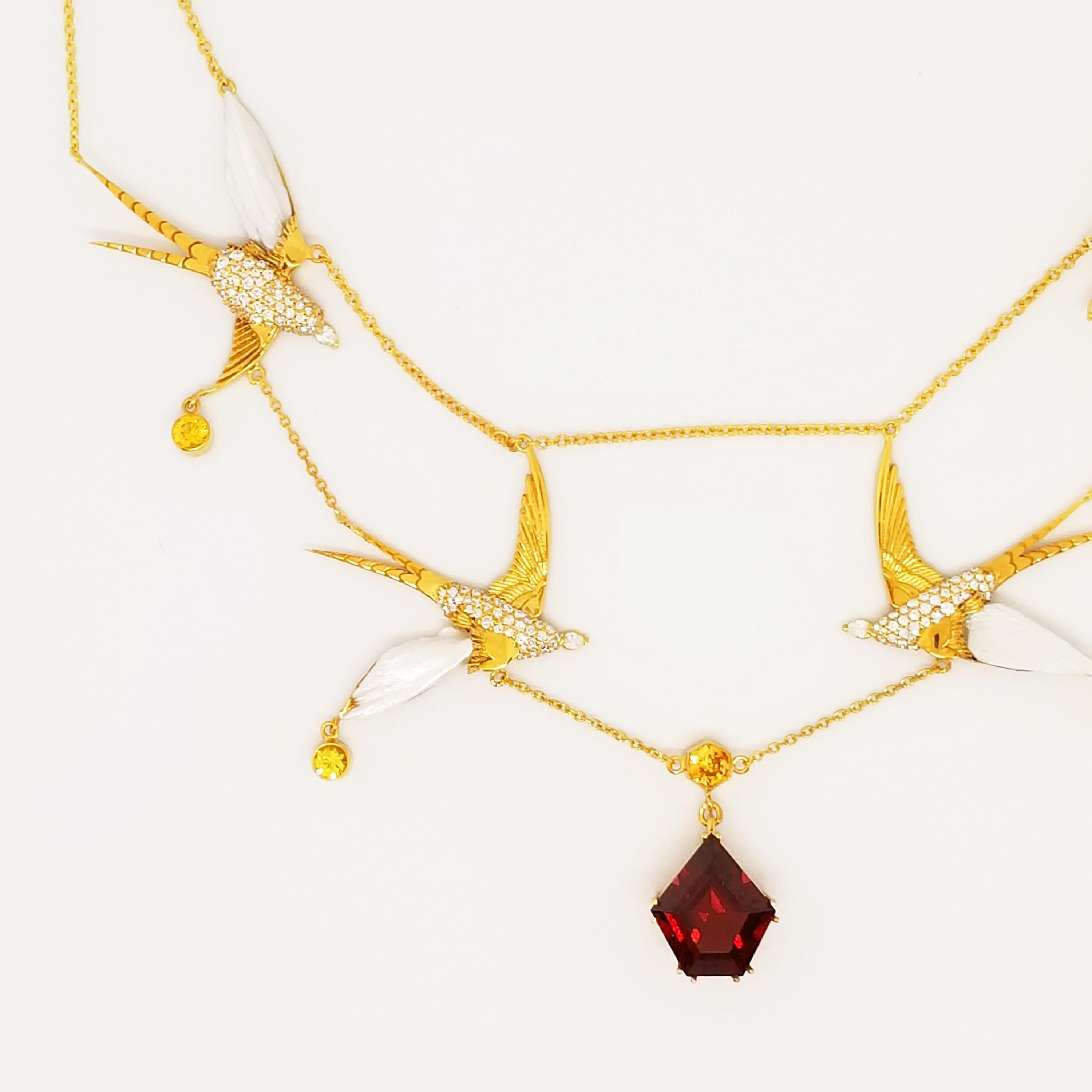 This Custom Designed and Crafted, One of a Kind Swag Necklace by Artisan Tom Castor features four elegant Swallow Birds. Attached on the double chain Swag style Necklace, the birds frame the Décolletage while directing attention to the Brilliant Red