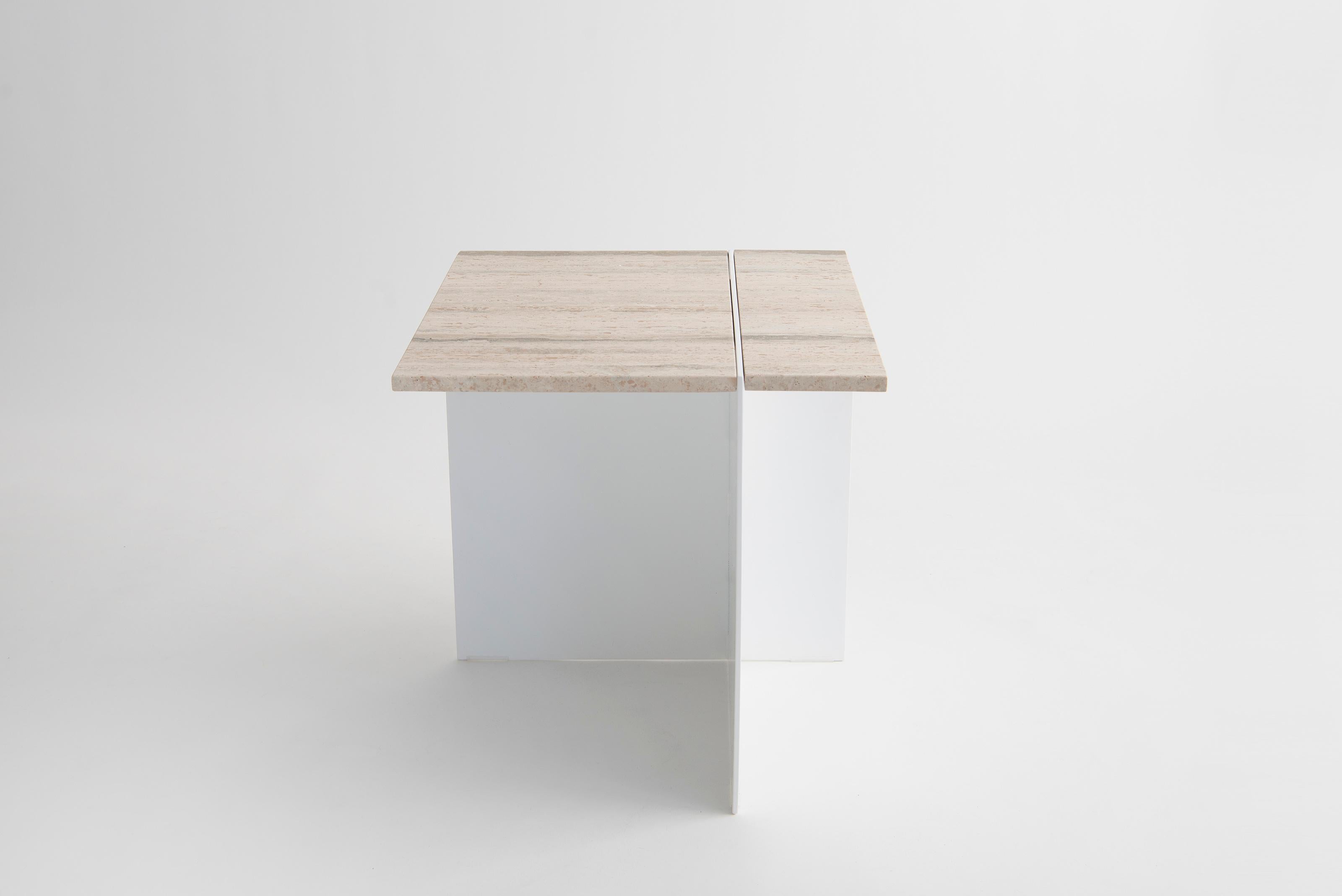 Division Side Table by Phase Design
Dimensions: D 50,8 x W 55,9 x H 55,9 cm. 
Materials: Powder-coated solid steel and travertine.

Solid steel sheet available in a flat black or white powder coat finish. Powder coat finishes are available in custom