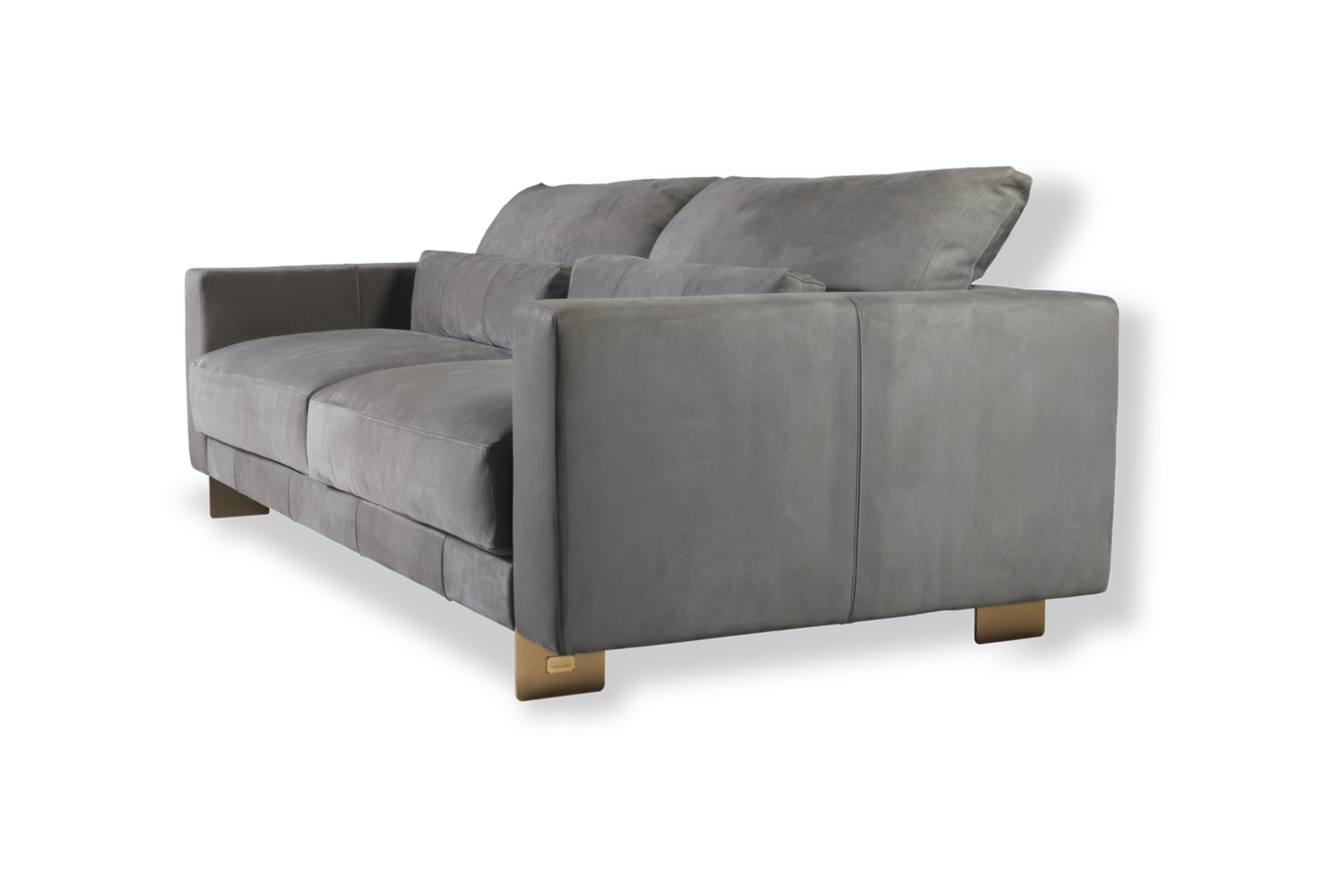 Feel like a movie star on this luxurious sofa upholstered with memory foam and down-filled cushions for extra comfort. Its bold, self-assured personality rests on sleekly designed metal feet that go through the clean shape of the frame juxtaposing