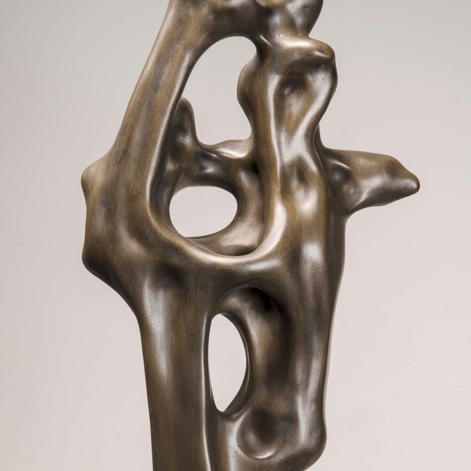 Svettante, bronzo ossidato su base in granito composito di pietra 