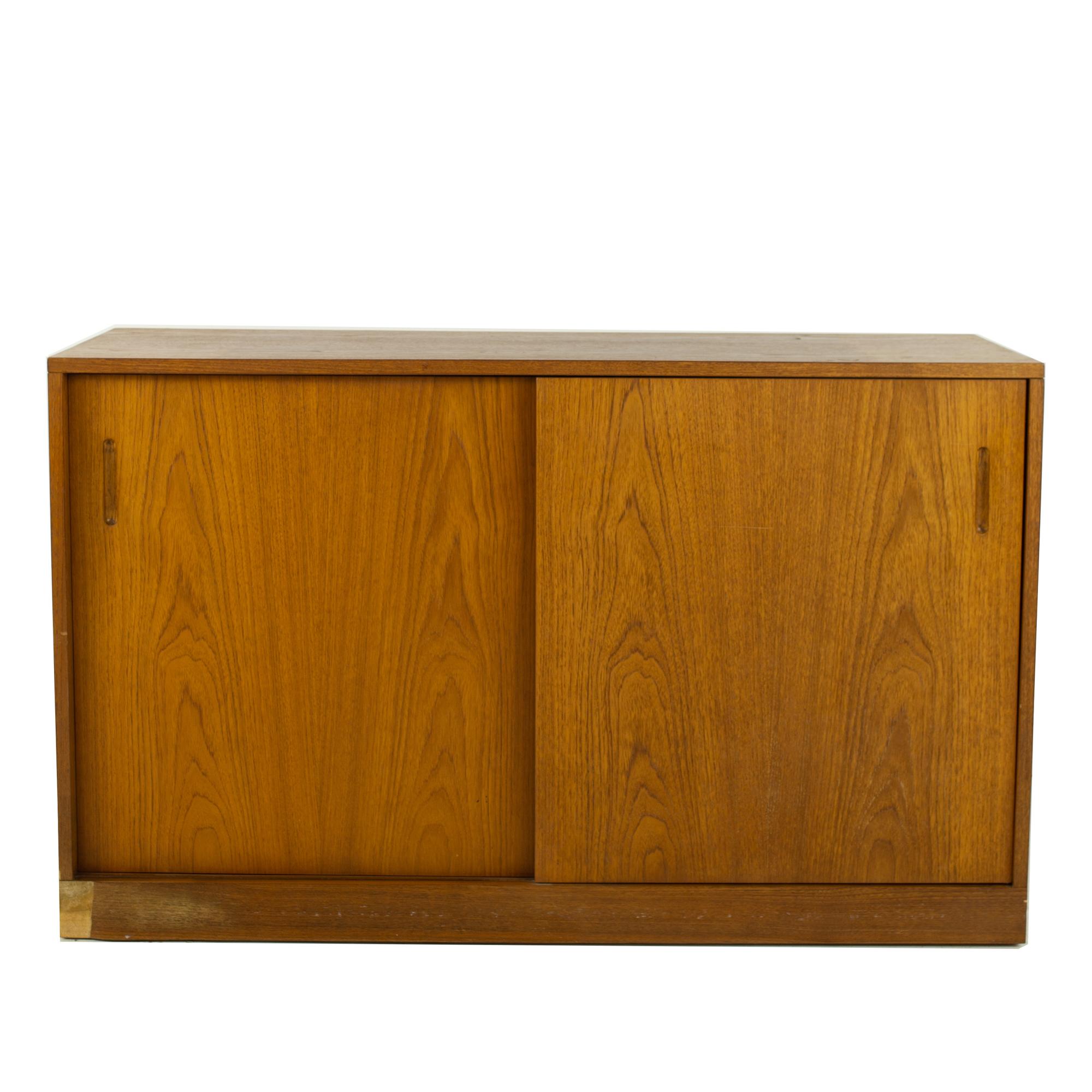 Dixie Furniture mid century teak sliding door media cabinet credenza
Credenza measures: 48 wide x 17.25 deep x 29 inches high

?All pieces of furniture can be had in what we call restored vintage condition. That means the piece is restored upon