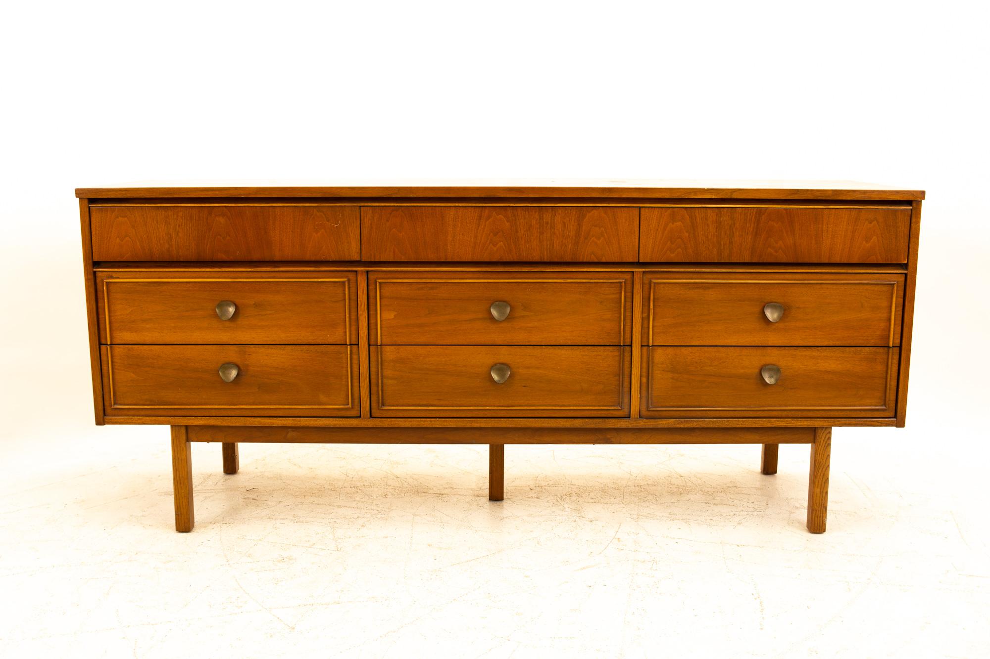 Dixie Furniture Mid Century  walnut 9-drawer lowboy dresser
Dresser measures: 71.75 wide x 18.5 wide x 31 high

All pieces of furniture can be had in what we call restored vintage condition. That means the piece is restored upon purchase so it’s