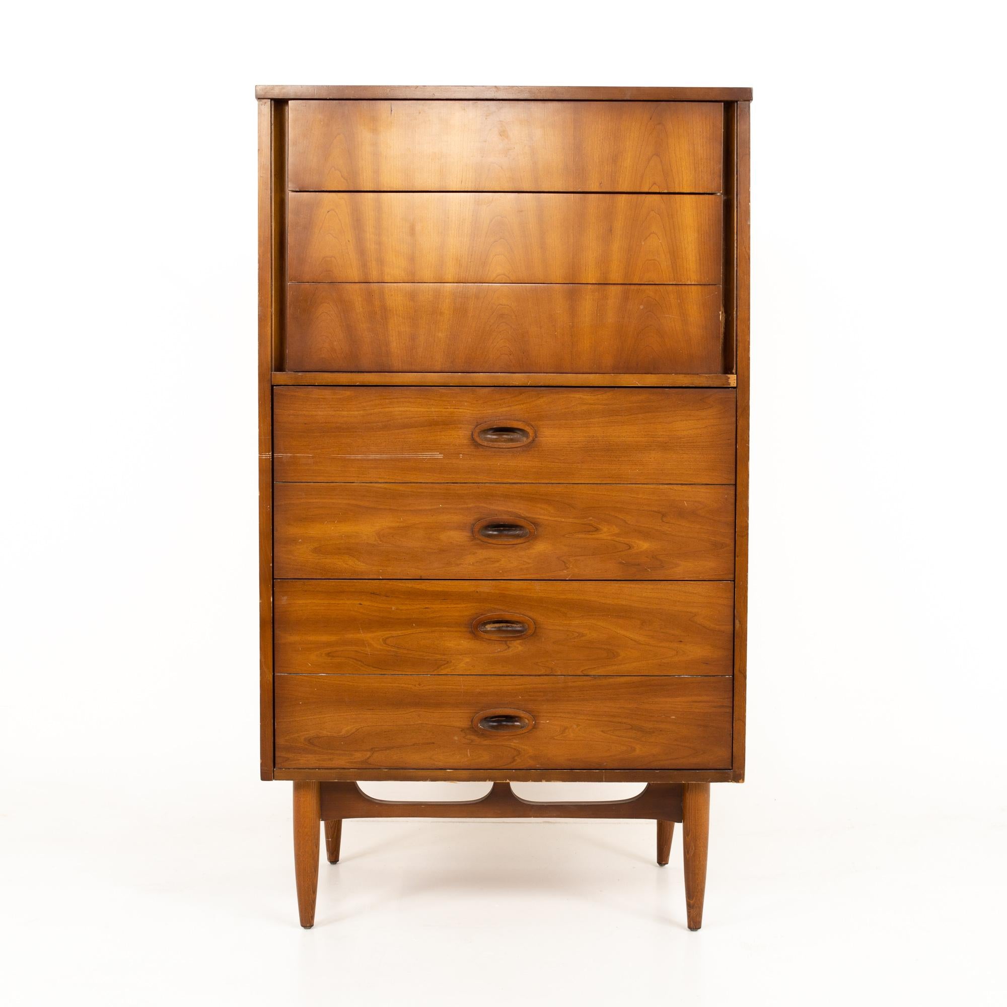 Dixie midcentury walnut 7-drawer thin highboy dresser
Dresser measures: 30.25 wide x 18.75 deep x 52.25 high


This price includes getting this piece in what we call restored vintage condition. That means the piece is permanently fixed upon
