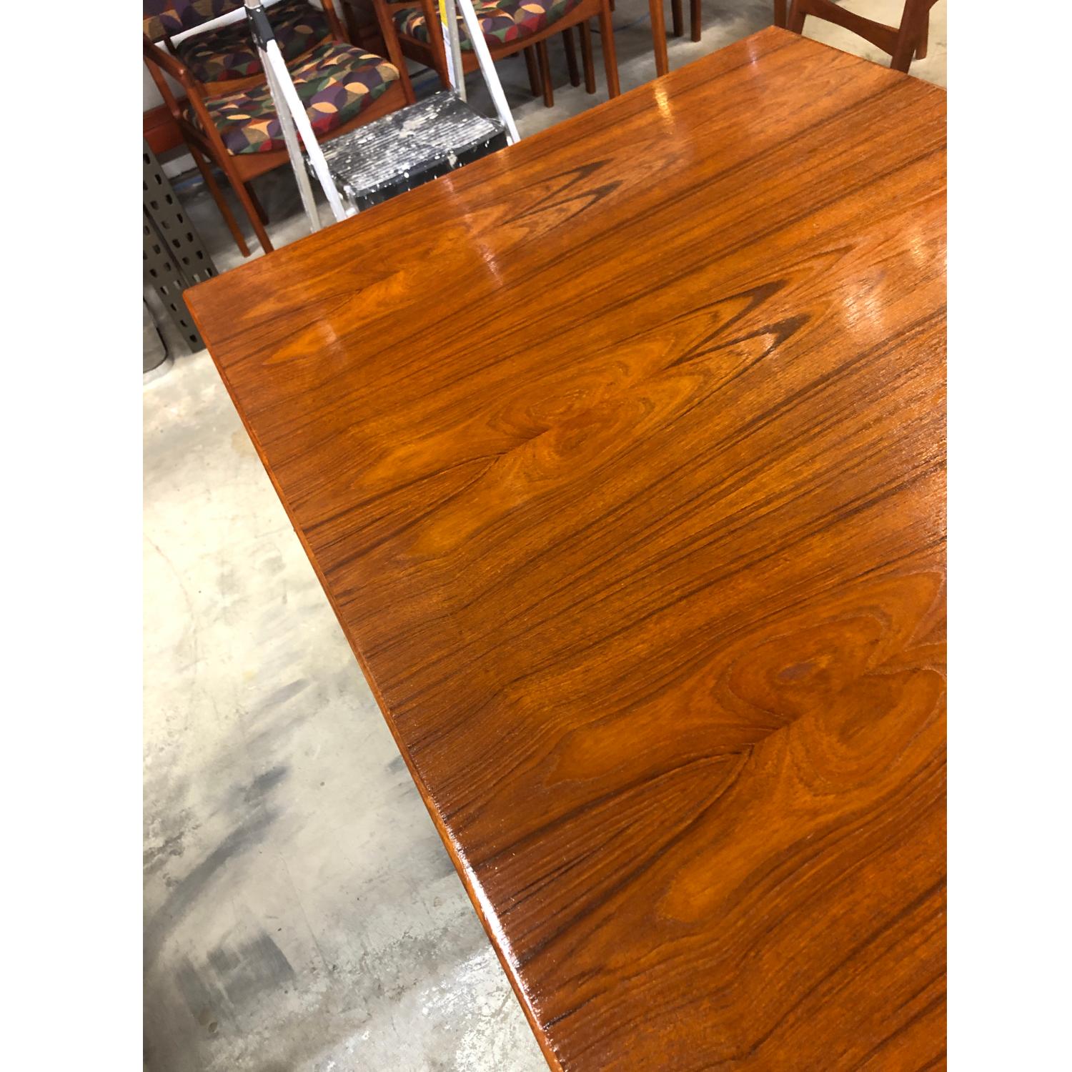 Dixie Teak Expanding Draw Leaf Petite Dining Table In Good Condition In Chattanooga, TN