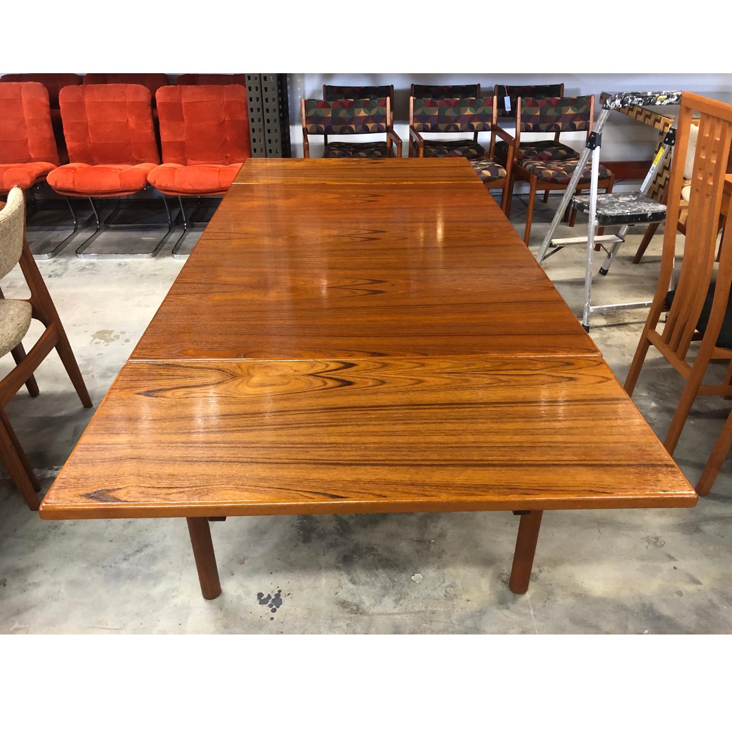 Late 20th Century Dixie Teak Expanding Draw Leaf Petite Dining Table