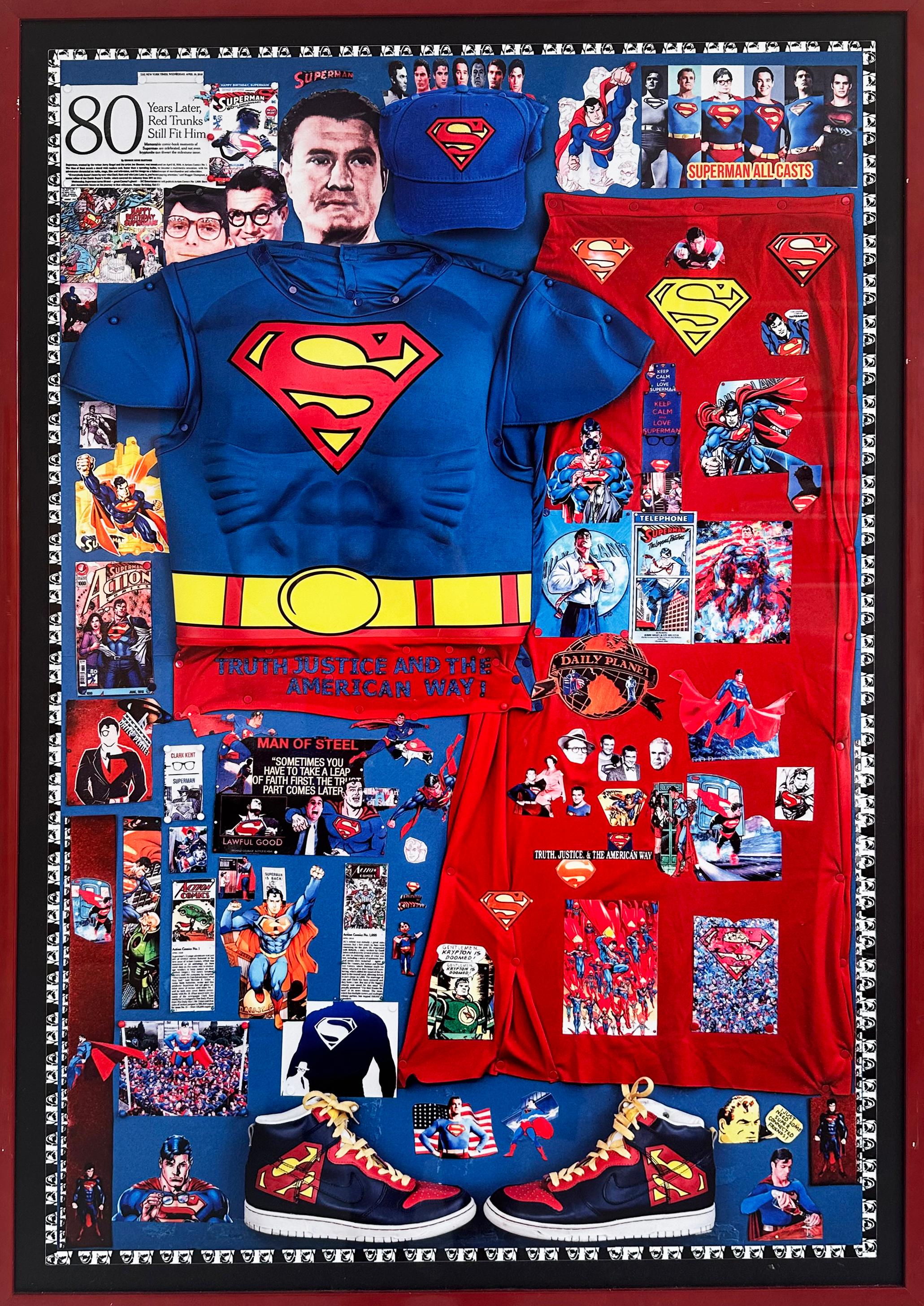 'Superman' by DJ Leon, 2020. 39 x 27 in. A dye-sublimation print on aluminum that is saturated in colors of reds and blues. The print incorporates, appropriates, and combines found images of superman with commercial memorabilia such as a Superman