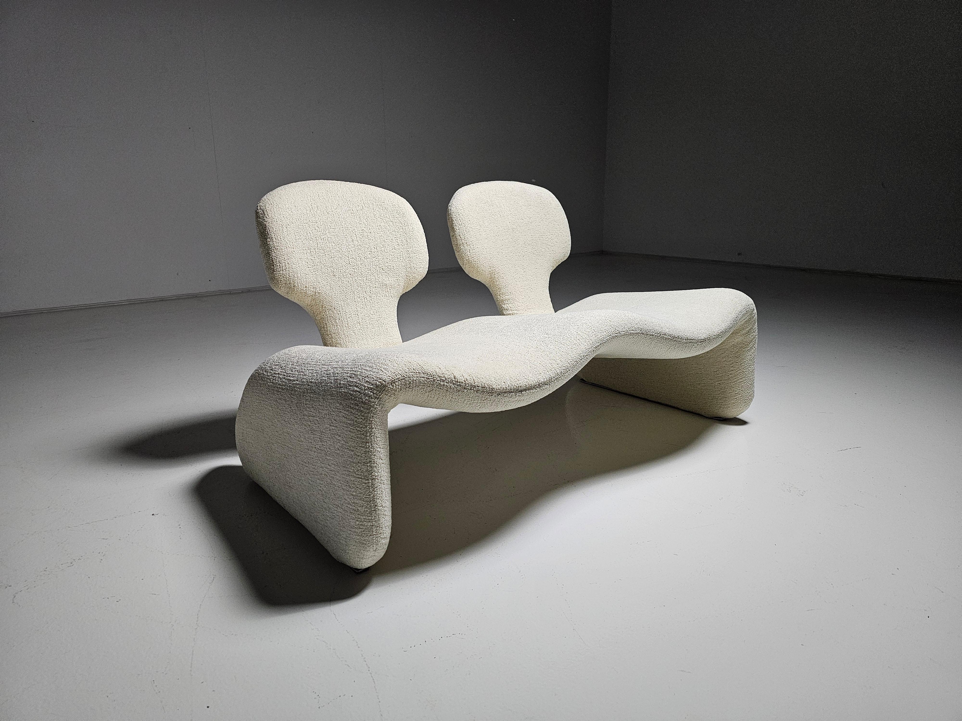 Djinn 2-seater sofa by Olivier Mourque. Reupholstered in a stunning cream bouclé.

The Djinn sofa is one element of a series of Djinn furniture designed by noted French designer Olivier Mourgue. In 1965 the first piece of the series, a Chaise