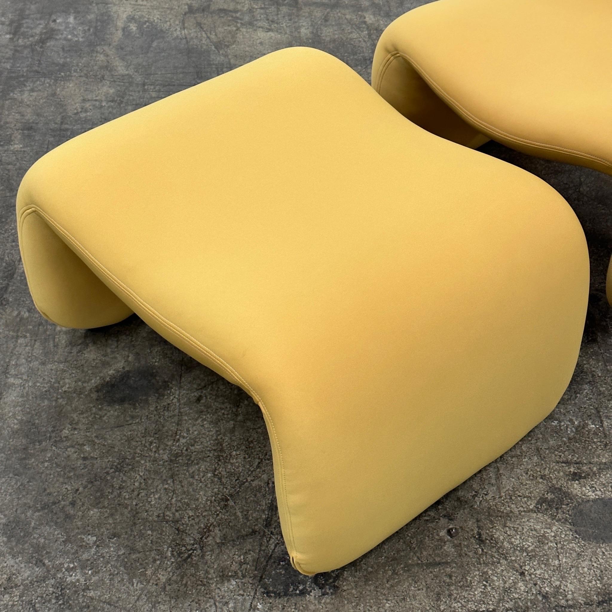 c. 1960s. Price is for the set. Extremely rare set made in France. As seen in 2001: A Space Odyssey. We reupholstered it and gave it new foam. The fabric is three stretch neoprene which is perfect for this curvy chair  