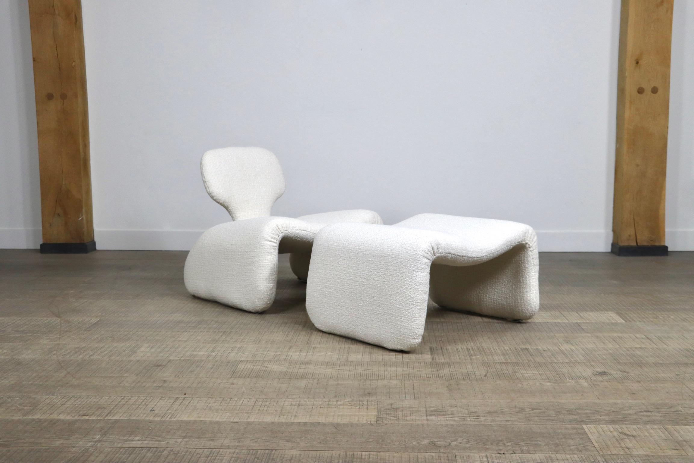 Amazing 'Djinn' Lounge chair with ottoman by Olivier Mourgue currently freshly recovered in a cream boucle fabric. This incredible sculptural design is also highly comfortable! This model can be seen in red upholstery in the movie 2001 Space