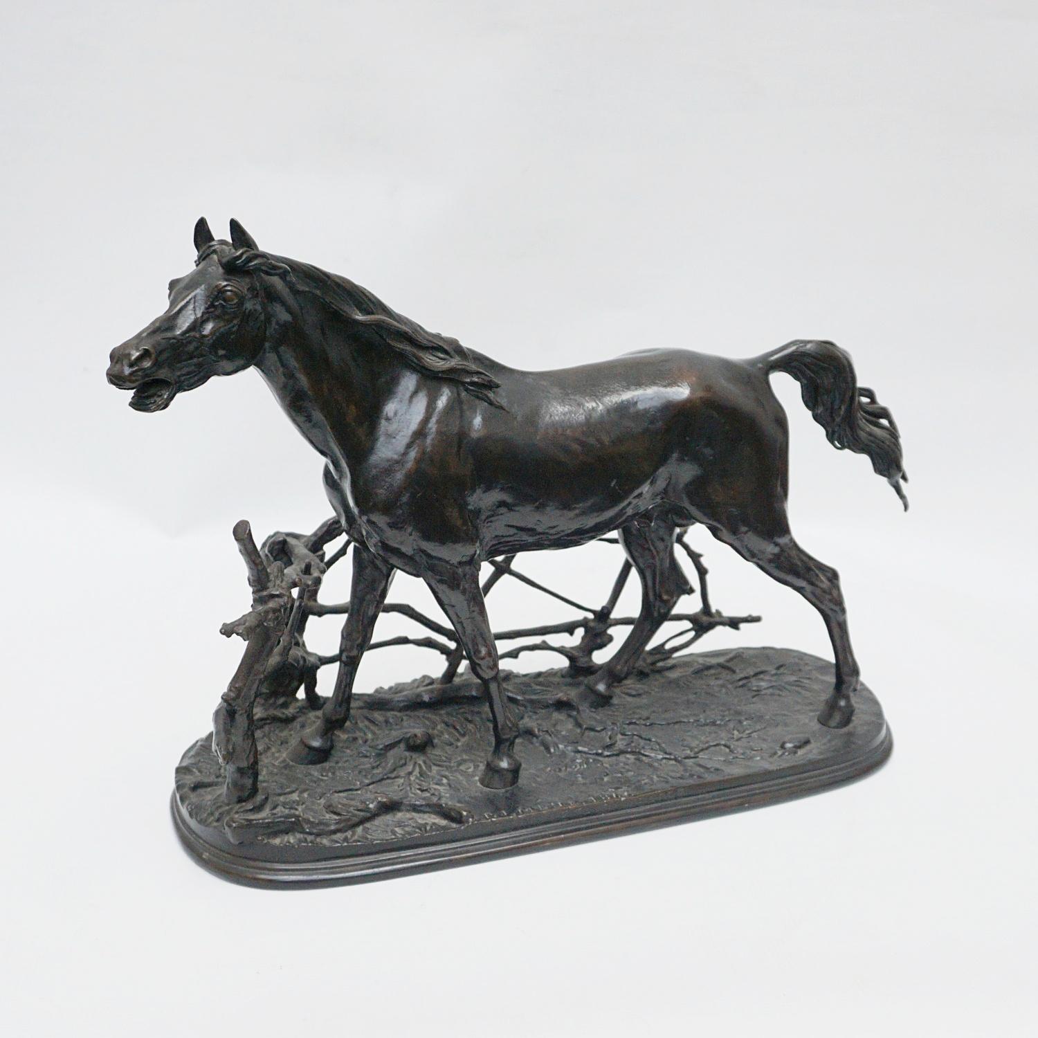 'Djinn Etalon Arabe', a patinated bronze study of a horse standing by a rustic fence. Set over an integral base with engraved detail. Signed P J Mêne 1846 with title to side.

Pierre- Jules Mêne was born in 1810 and worked as a teenager for his