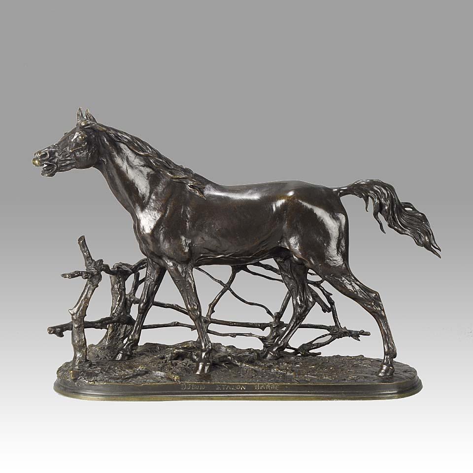 A very fine French Animaliers bronze study of a stallion standing behind a post and rail fence exhibiting excellent hand finished surface detail and good colour, entitled ‘Djinn Etlalon Barbe’, dated 1846 and signed P.J Mêne.

 

ADDITIONAL
