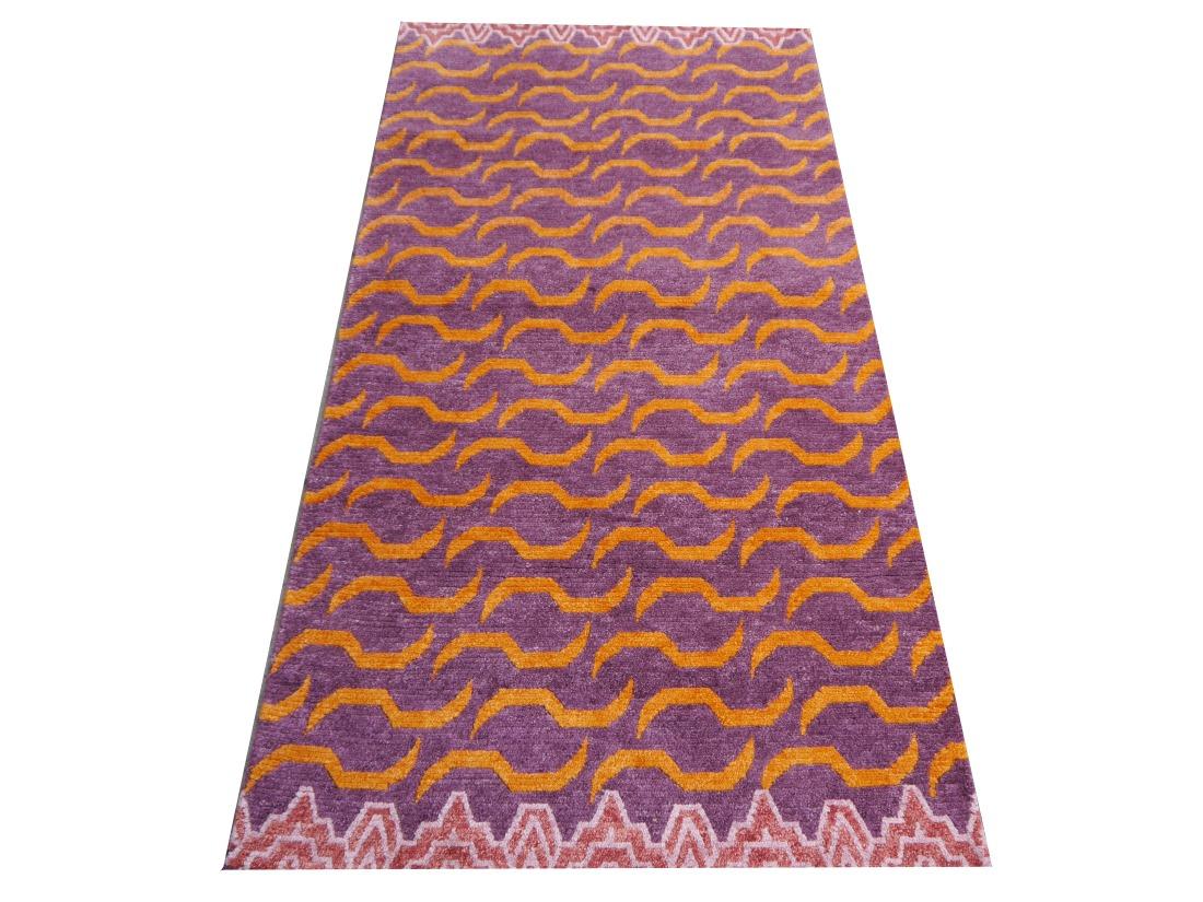 A Djoharian Collection Tiger rug, hand knotted in Nepal - 6.0 x 3.0 ft
Origin: Nepal
Pile material: 100% Wool 
Colors: Lilac, Orange, Pink
Warp and weft: Cotton
Design: Tiger Rug
Length: 6.0 ft - 180 cm
Width: 3.0 ft - 92 cm
Pile height: Approx. 1/2