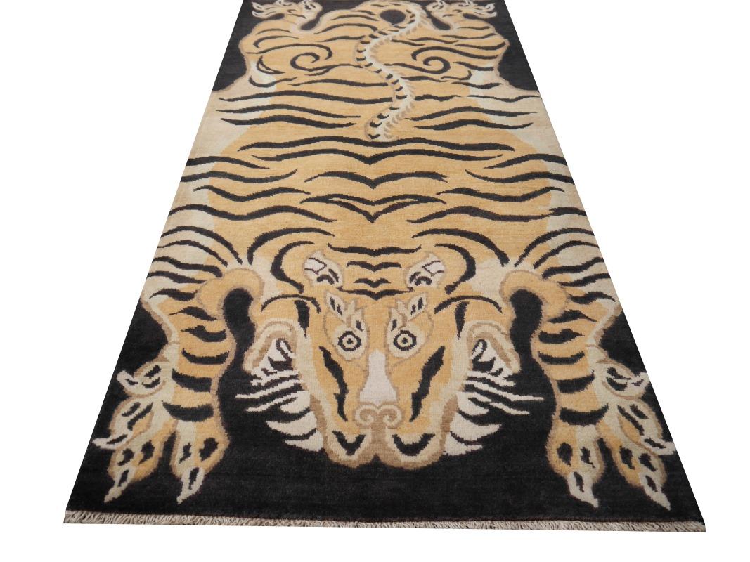 A Djoharian Collection Tiger rug, hand knotted in Afghanistan - 6.6 x 3.3 ft
Origin: Afghanistan
Pile material: 100% Wool 
Warp and weft: Cotton
Design: Tiger Rug
Length: 6.6 ft - 200 cm
Width: 3.3 ft - 100 cm
Pile height: Approx. 1/3 inch, 0,8