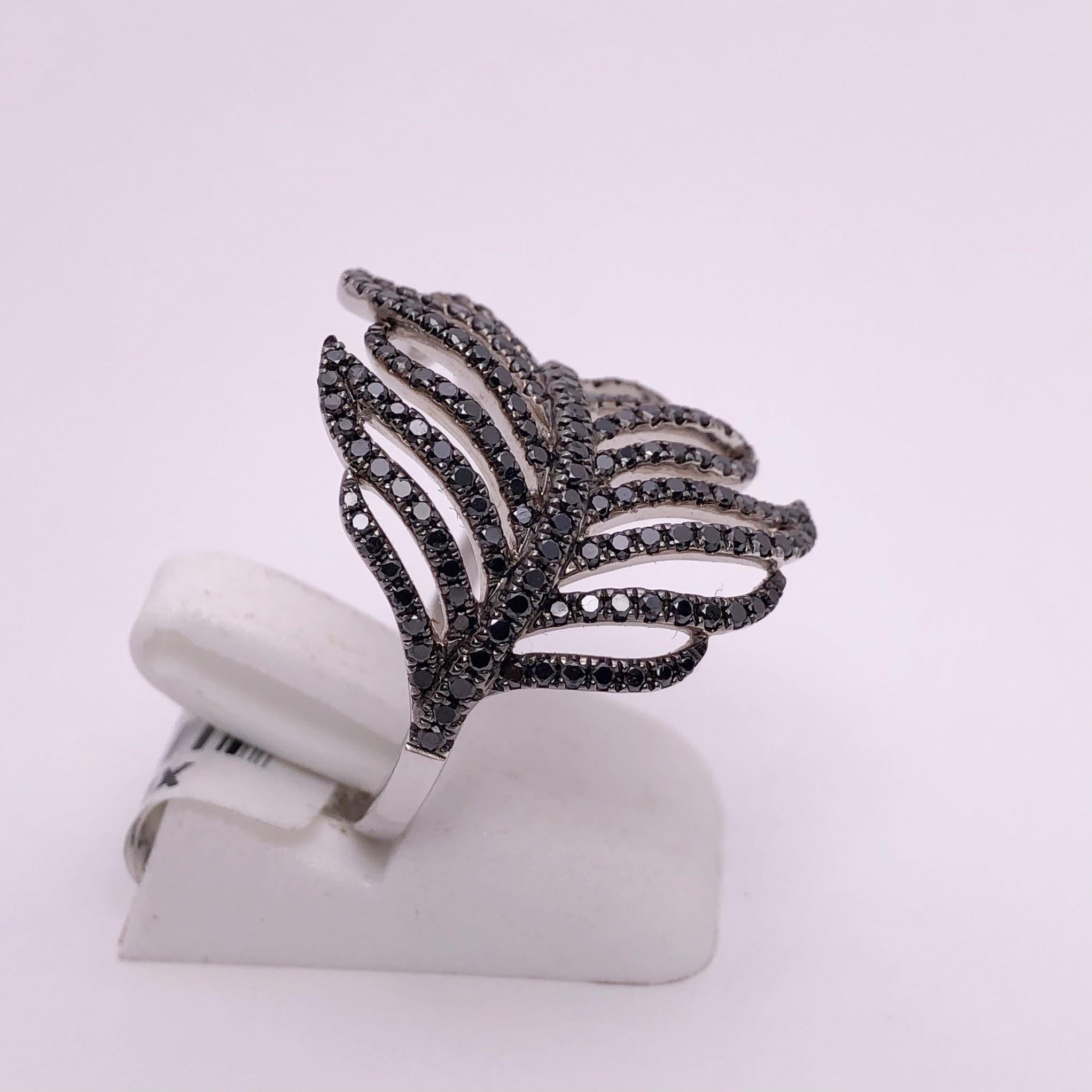 Modern D'Jula 18 Karat White Gold Feather Ring with 1.00 Carat Black Diamonds For Sale