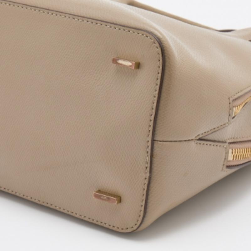 De las mujeres Cartera DKNY de piel beige con forma de cúpula en venta