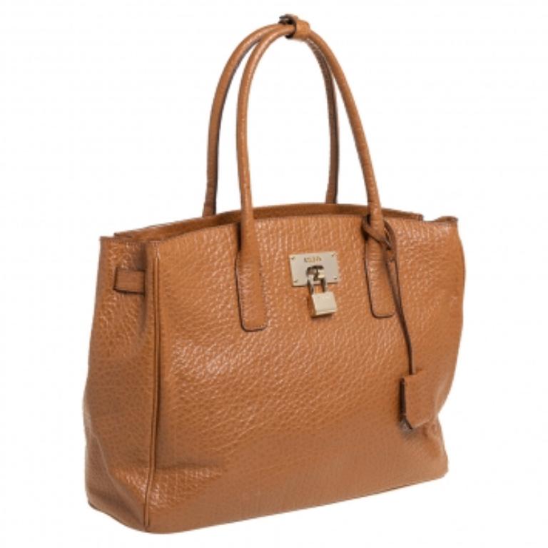 DKNY Caramel Brown Pebbled Leather Padlock Tote For Sale 1
