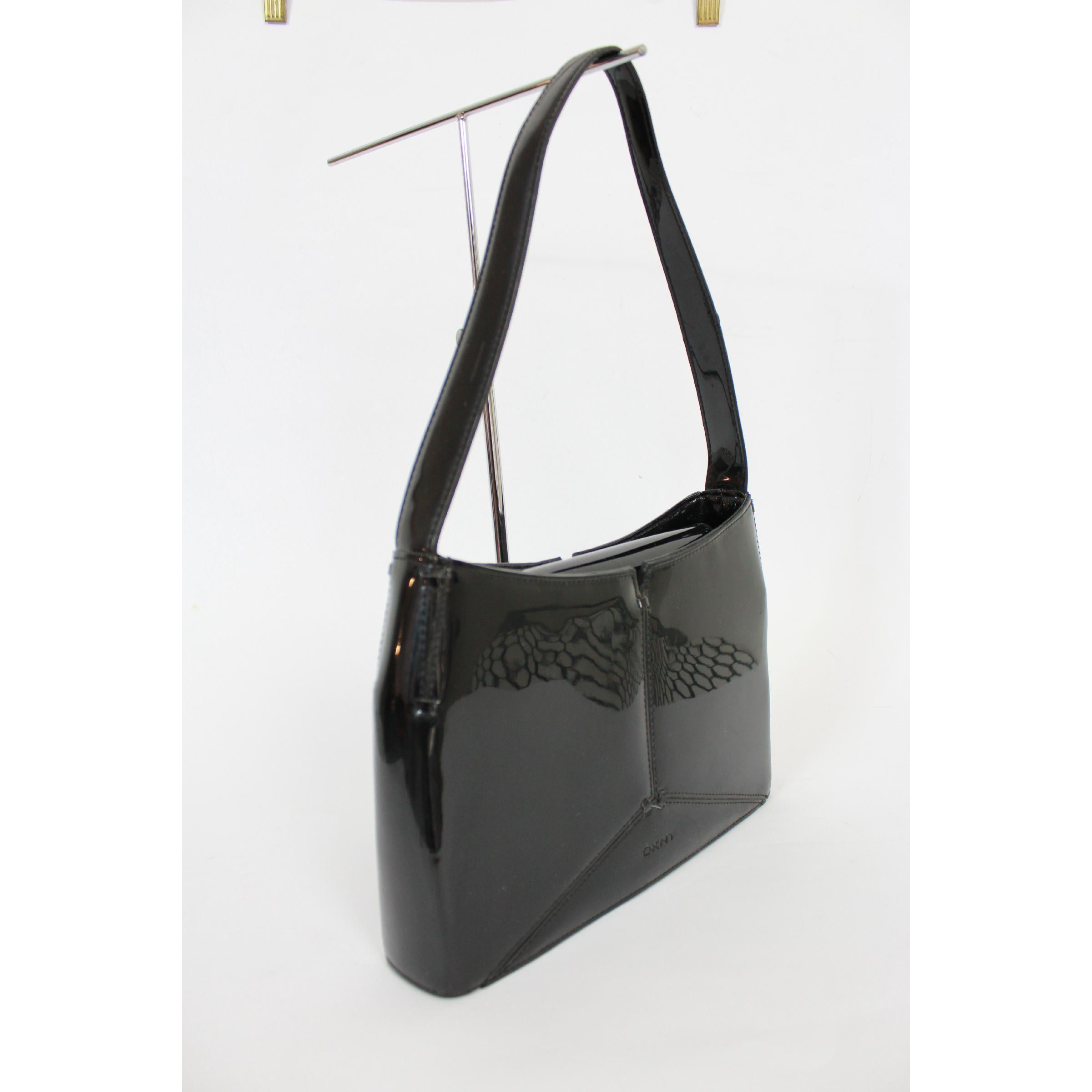 black patent leather shoulder bag