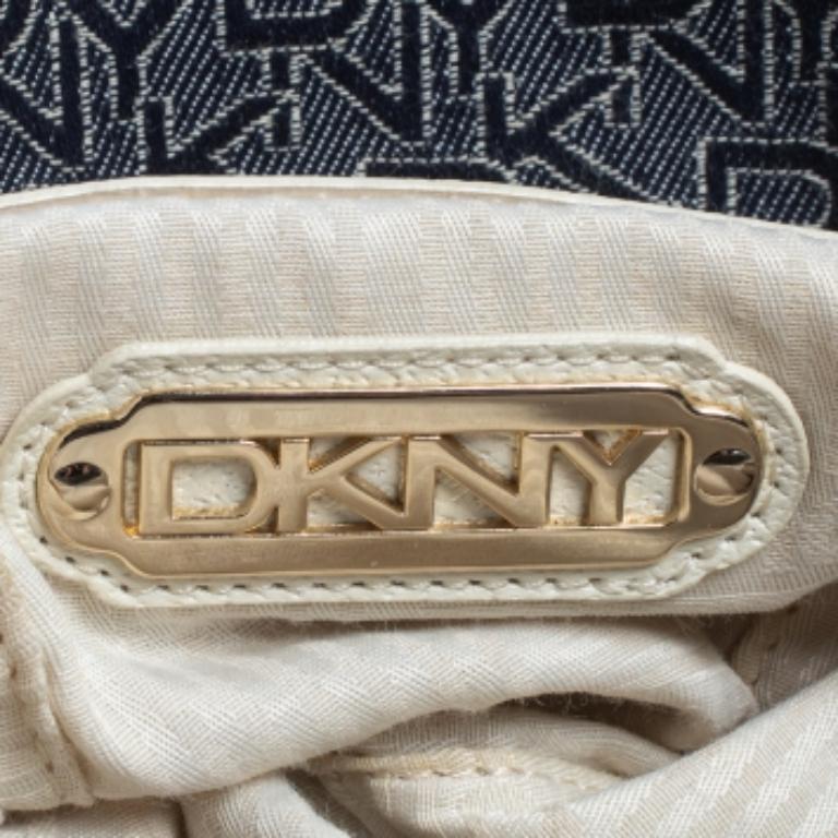 Noir Dkny Hobo en toile et cuir Monogram bleu marine/brun en vente