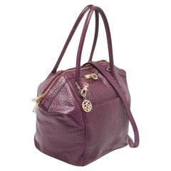 DKNY - Sacoche à fermeture éclair en cuir texturé violet avec logo
