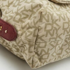 DKNY Rot/Beige Monogram Canvas und Leder Turnlock Pocket Satchel