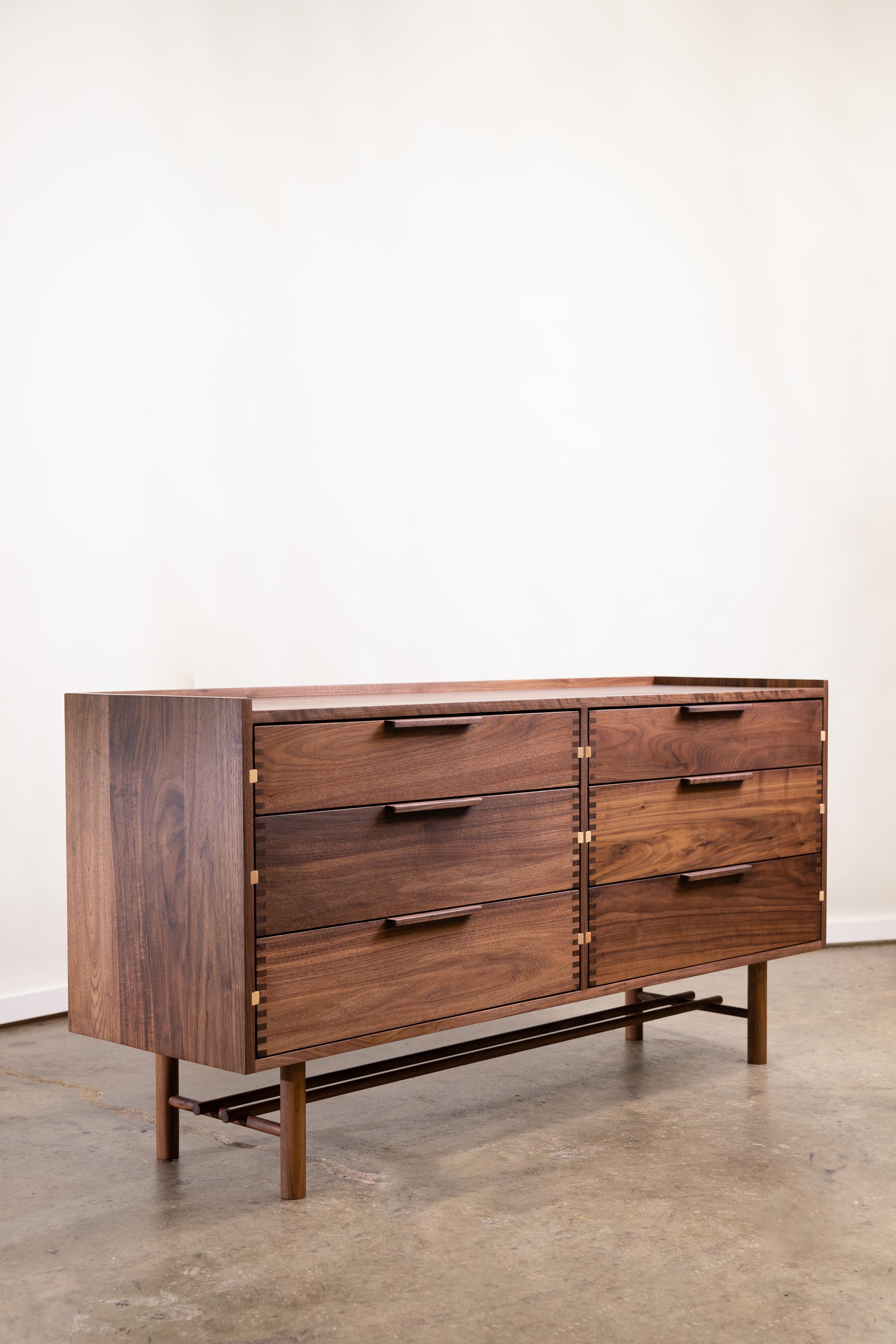 The DL Dresser is a simple, Japanese-inspired piece that celebrates honest construction through exposed joinery and a calm, balanced design. Each detail is intentional—from the subtle proportions of its frame to the tactile feel of its solid-wood