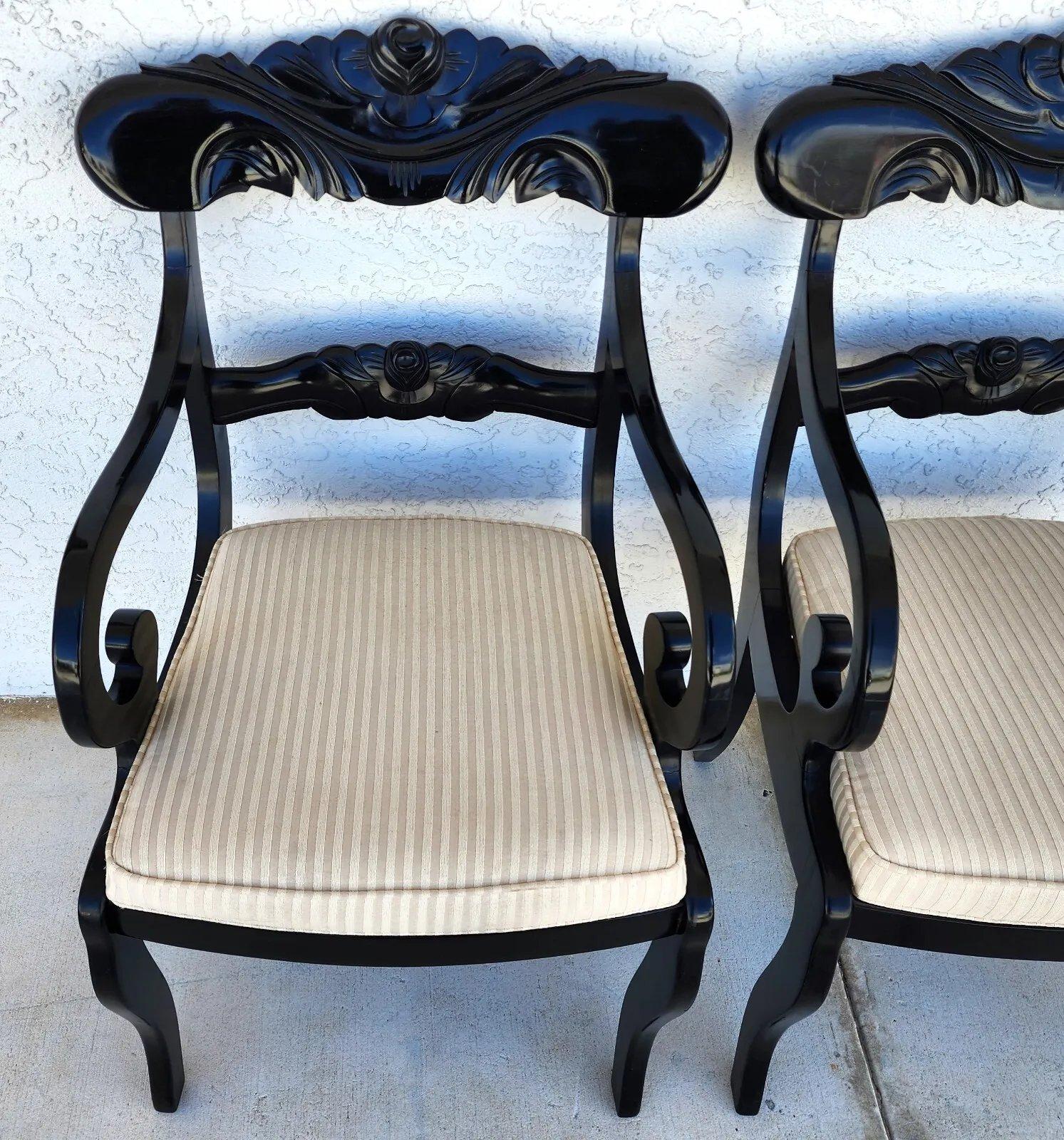 For FULL item description click on CONTINUE READING at the bottom of this page.

Offering One Of Our Recent Palm Beach Estate Fine Furniture Acquisitions Of A
Pair of English Regency Scroll Arm Ebonized Dining Accent Chairs 
With wonderful