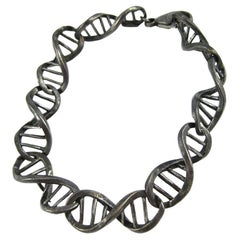 Pulsera ADN de plata de ley