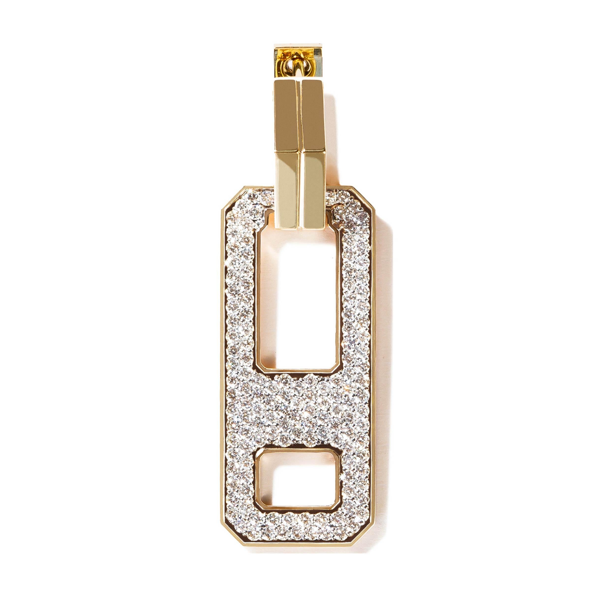 Add a touch of glamour to your everyday with our dangling drop earring.

Crafted in 18k gold, this chic earring is detailed with an angled solid gold huggie hoop and finished with a pave diamond drop design. Dress up your everyday wear, or elegantly