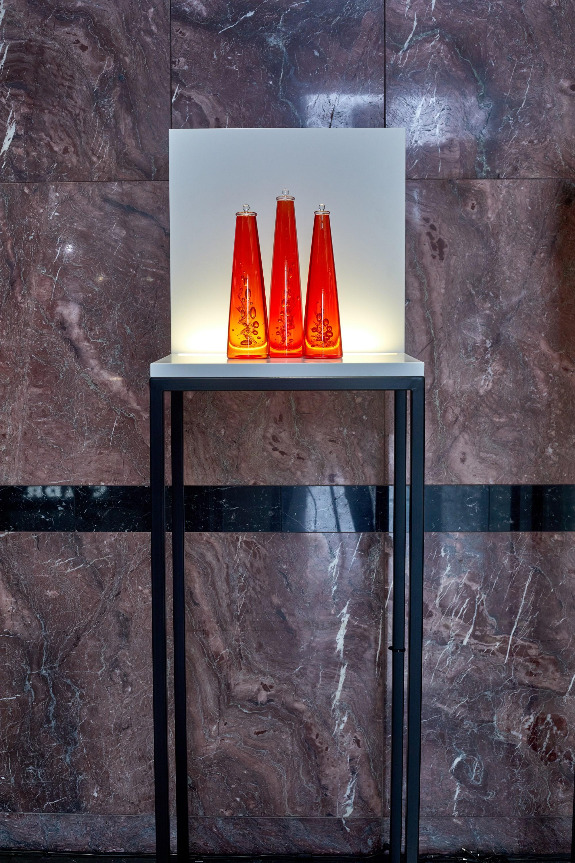 British DNA Sequence II, a Red Scientific Bottle Inspired Installation by Louis Thompson
