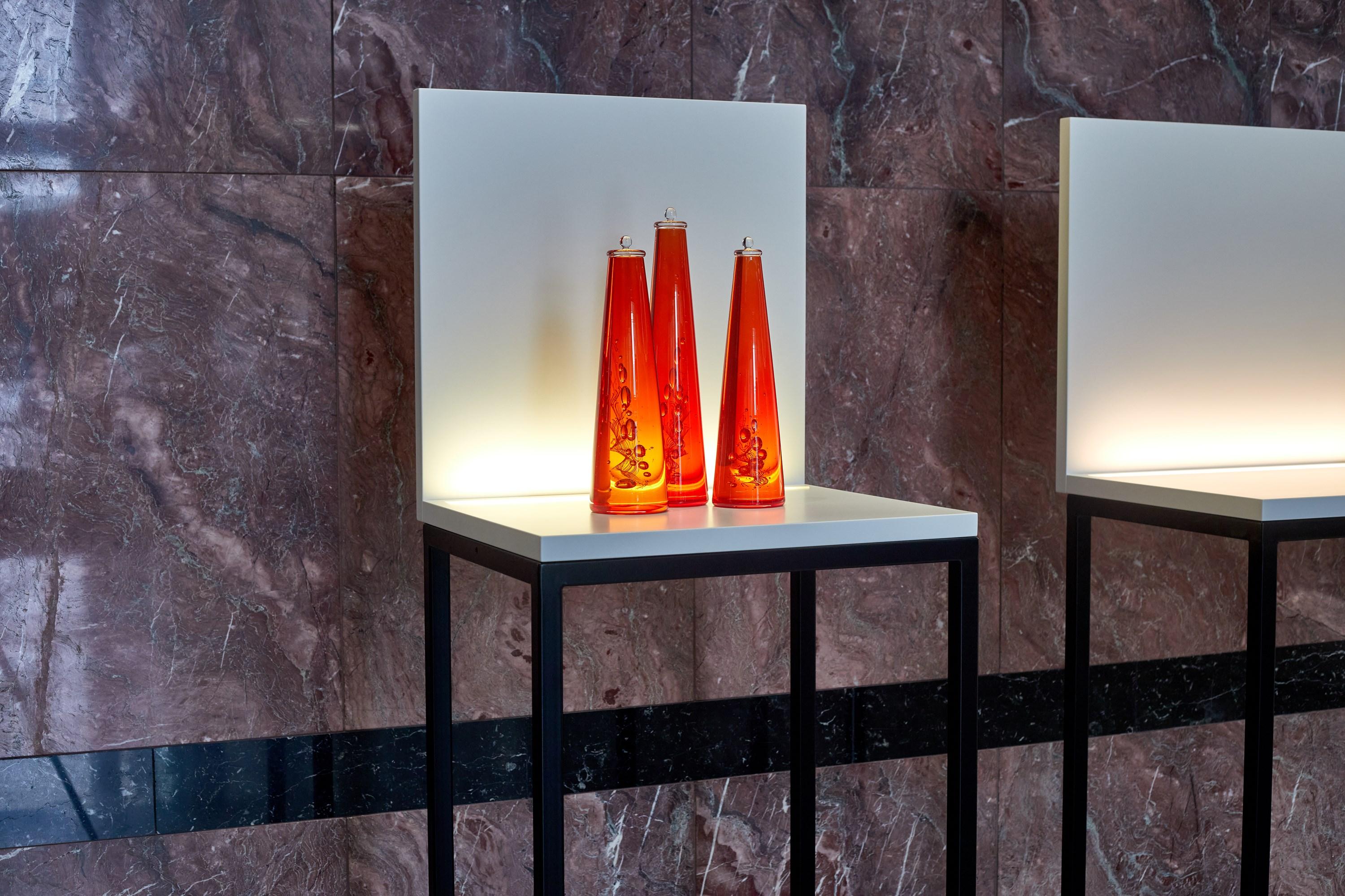 Hand-Crafted DNA Sequence II, a Red Scientific Bottle Inspired Installation by Louis Thompson