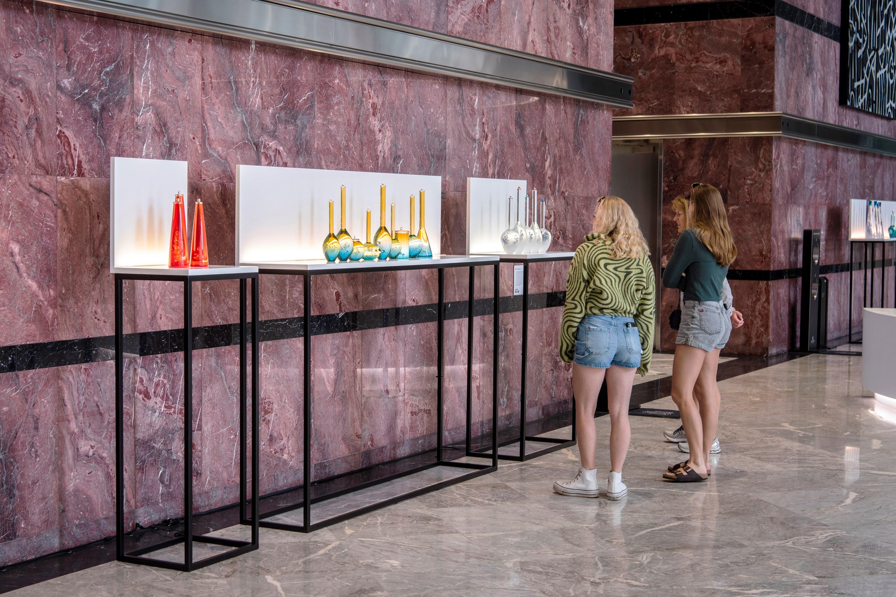 Glass DNA Sequence II, a Red Scientific Bottle Inspired Installation by Louis Thompson