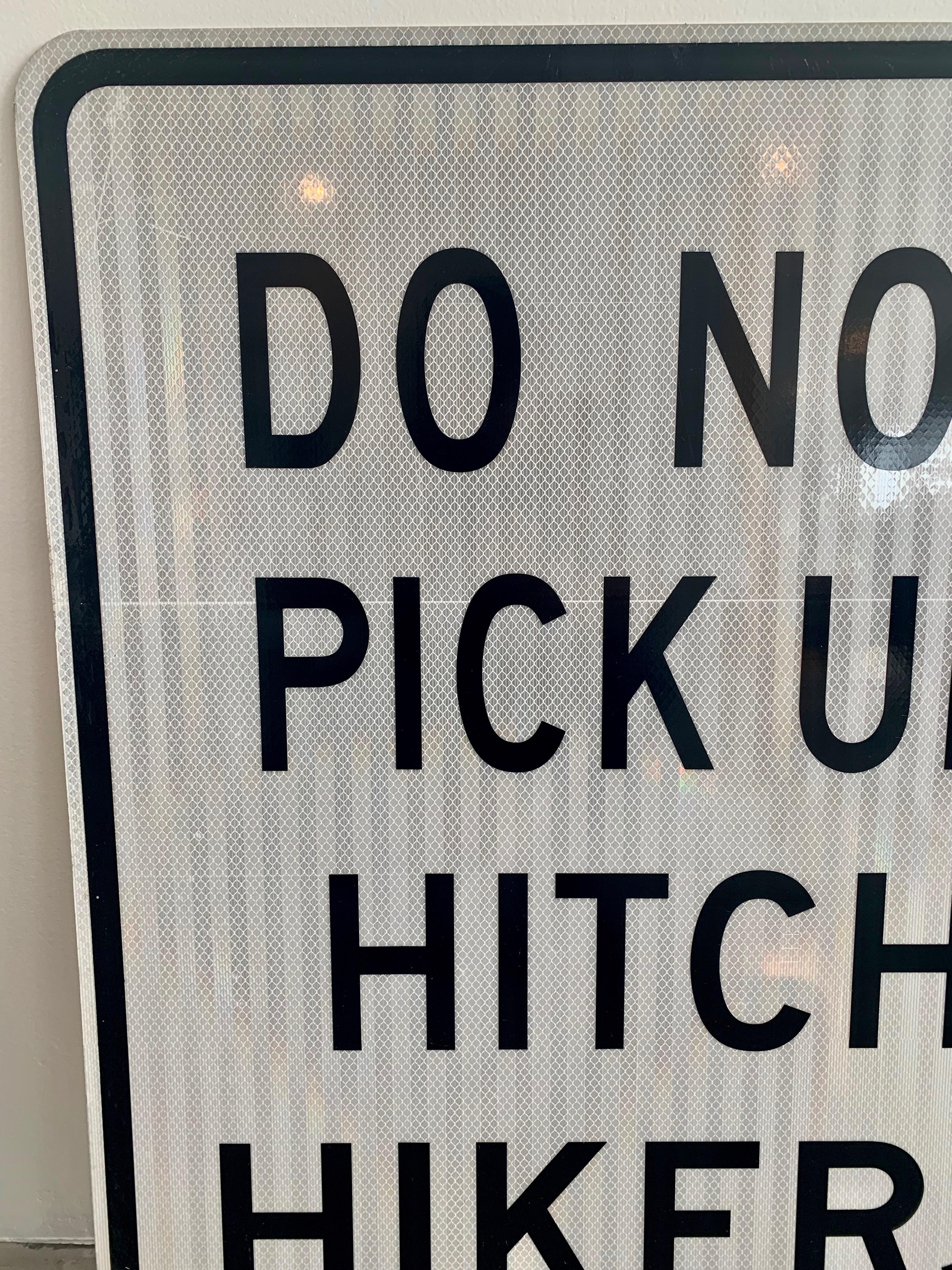 no hitchhiking sign