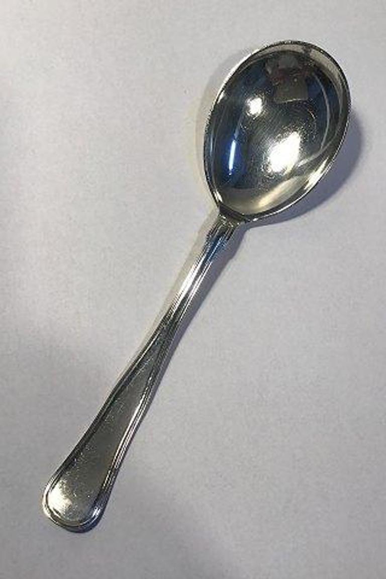 Dobbeltriflet/Old Danish silver serving spoon cohr.

Measures 21.5 cm(8 15/32 in).
 