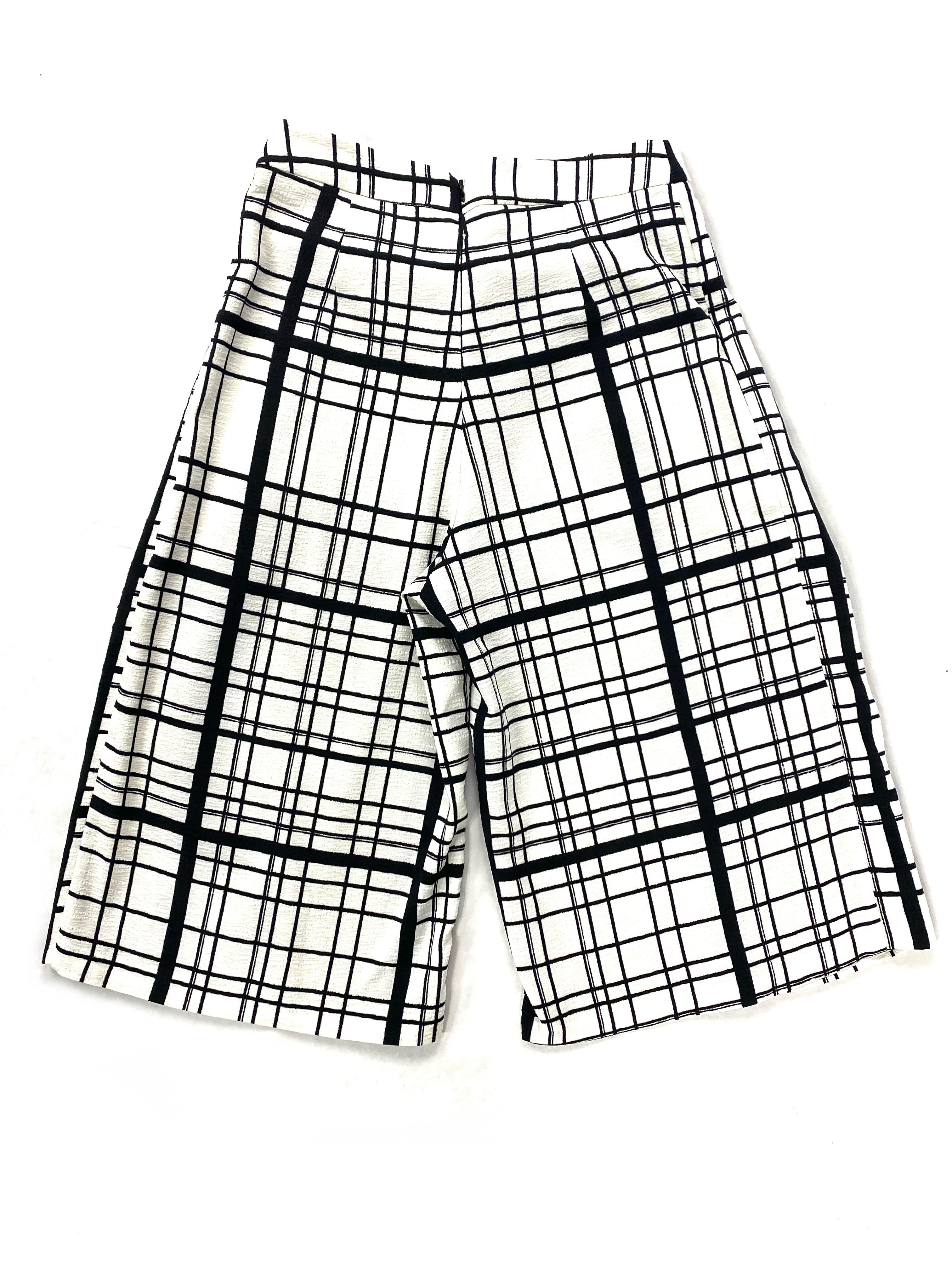 Einzelheiten zum Produkt:

Die Hose hat ein schwarz-weißes Karomuster, ein weites Bein (12 Zoll breit) und eine hohe Taille.