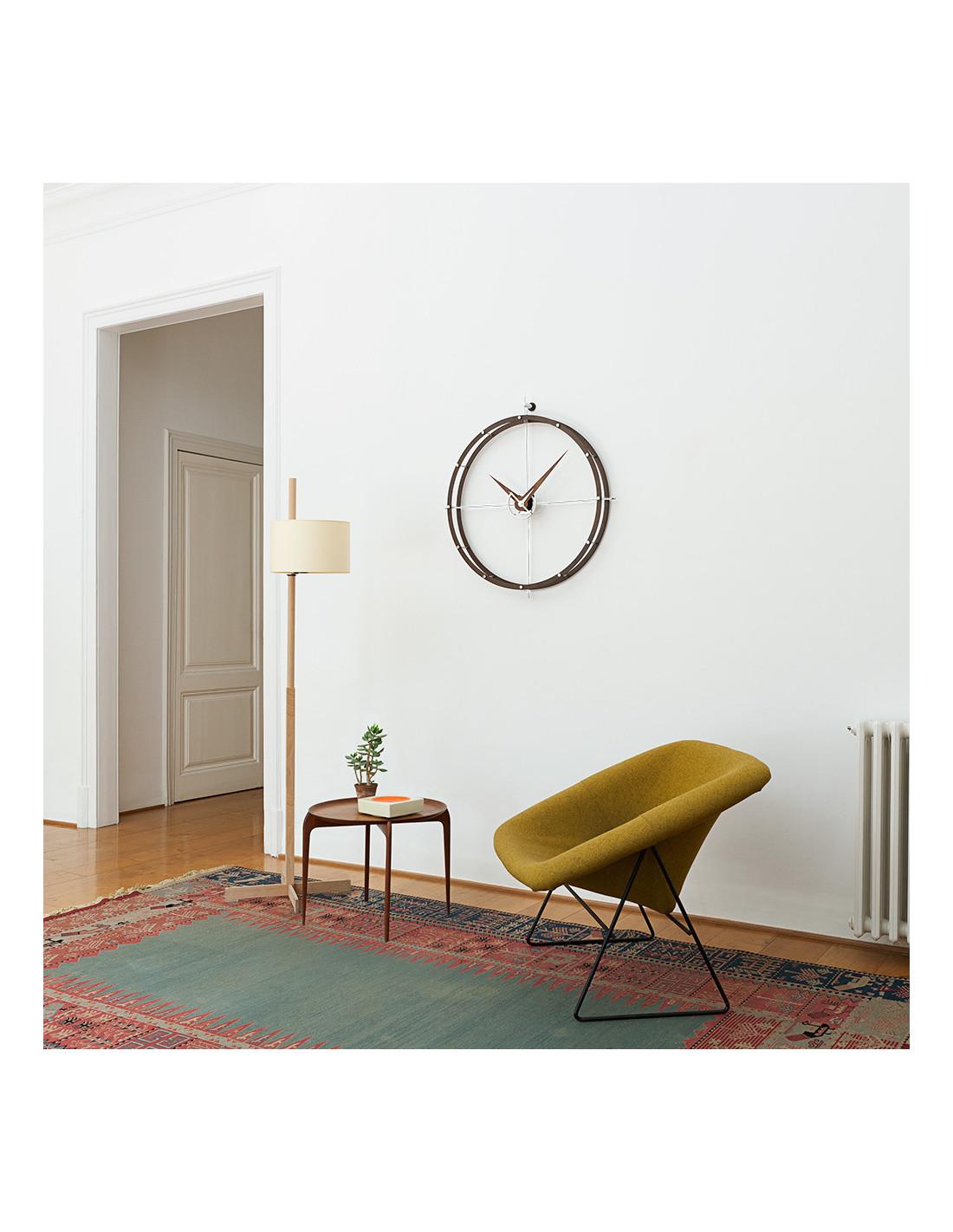 This elegant designer clock presents a diameter of 70 centimeters and a height of 80 cm that covers any space with elegance.
Doble O N wall clock: Rings and hands in wenge wood .
Not OK for Outdoor Use
Warranty: 1 year
Each clock is a unique