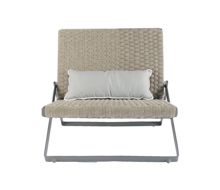 The Dobra outdoor lounge chair is part of the Dobra furniture line which is designed with the concept of a continuous steel bar folded to create legs and frames for the different components.
