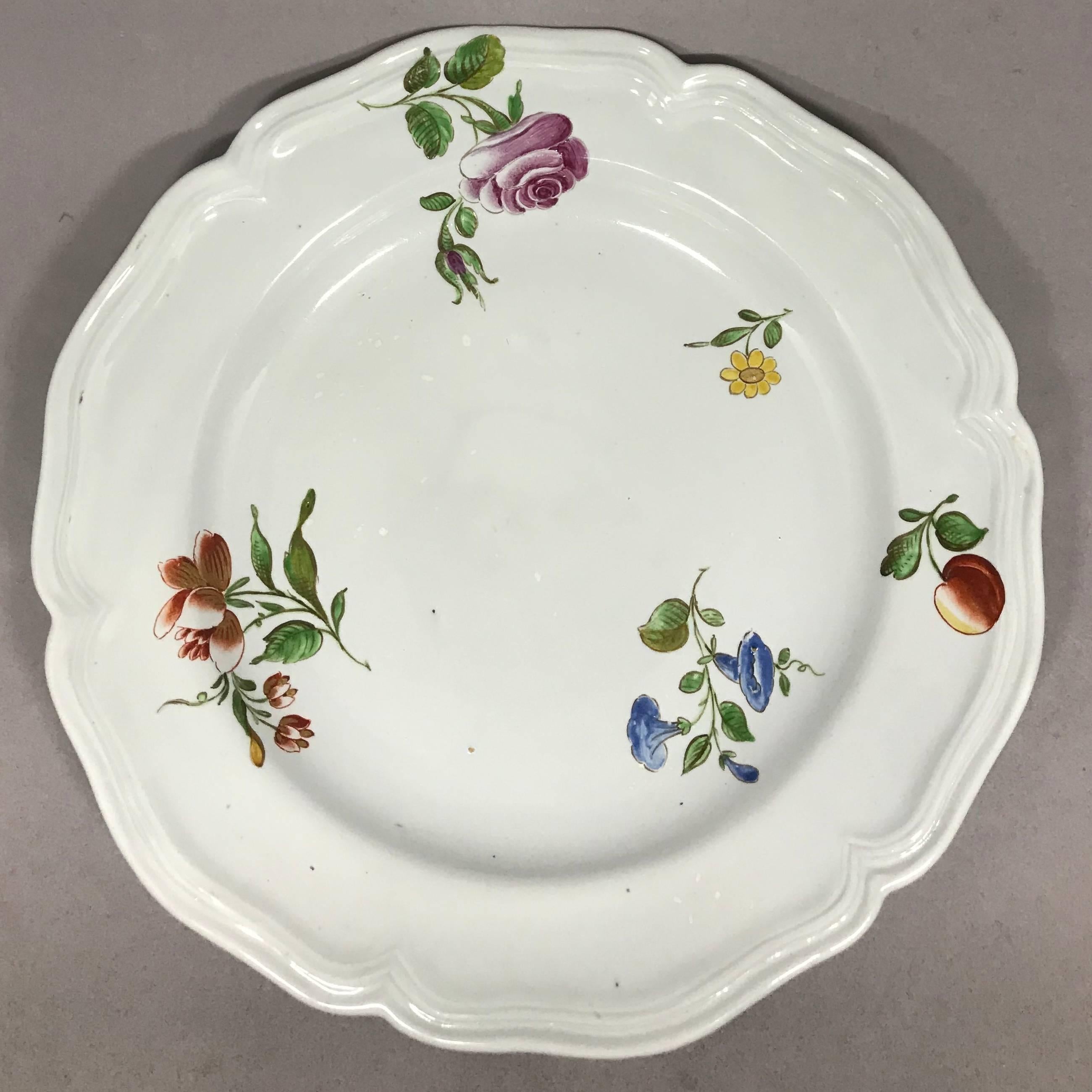 Doccia floral plate.  Antique Italian scallop-edge plate with hand-painted and gilt floral sprays, Italy, circa 1770.
Dimensions: 8.5